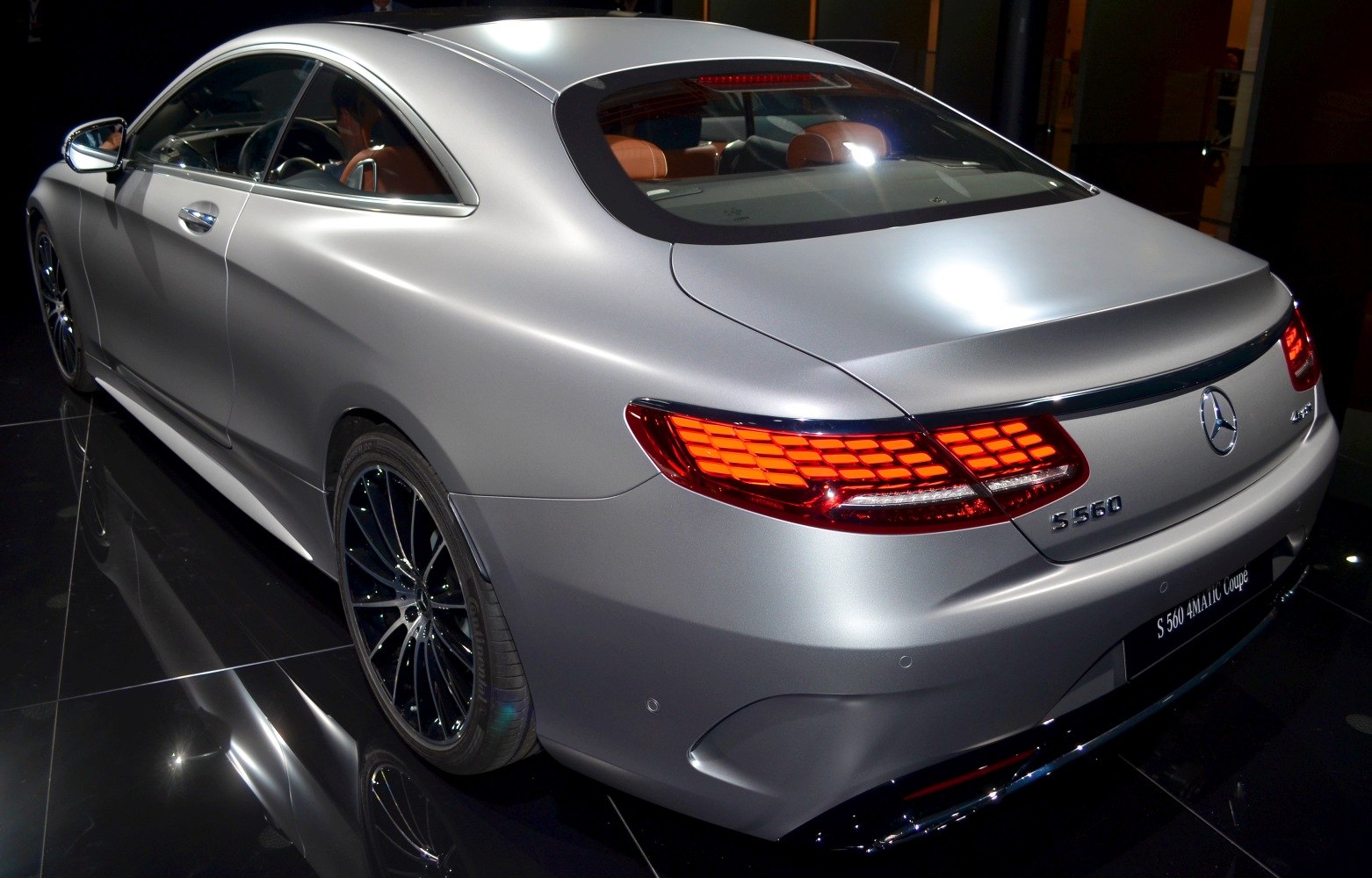 Rear view with LED taillights and sleek coupe silhouette