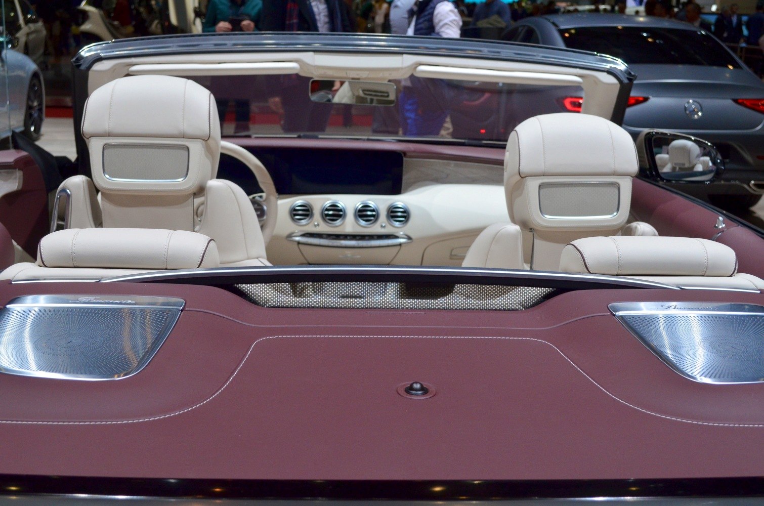 Convertible interior with beige leather seats and rear wind deflector