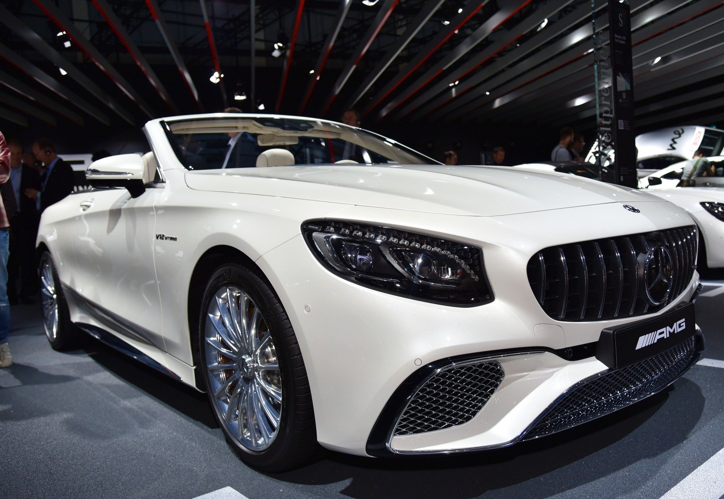 Front grille and headlights of a white luxury convertible