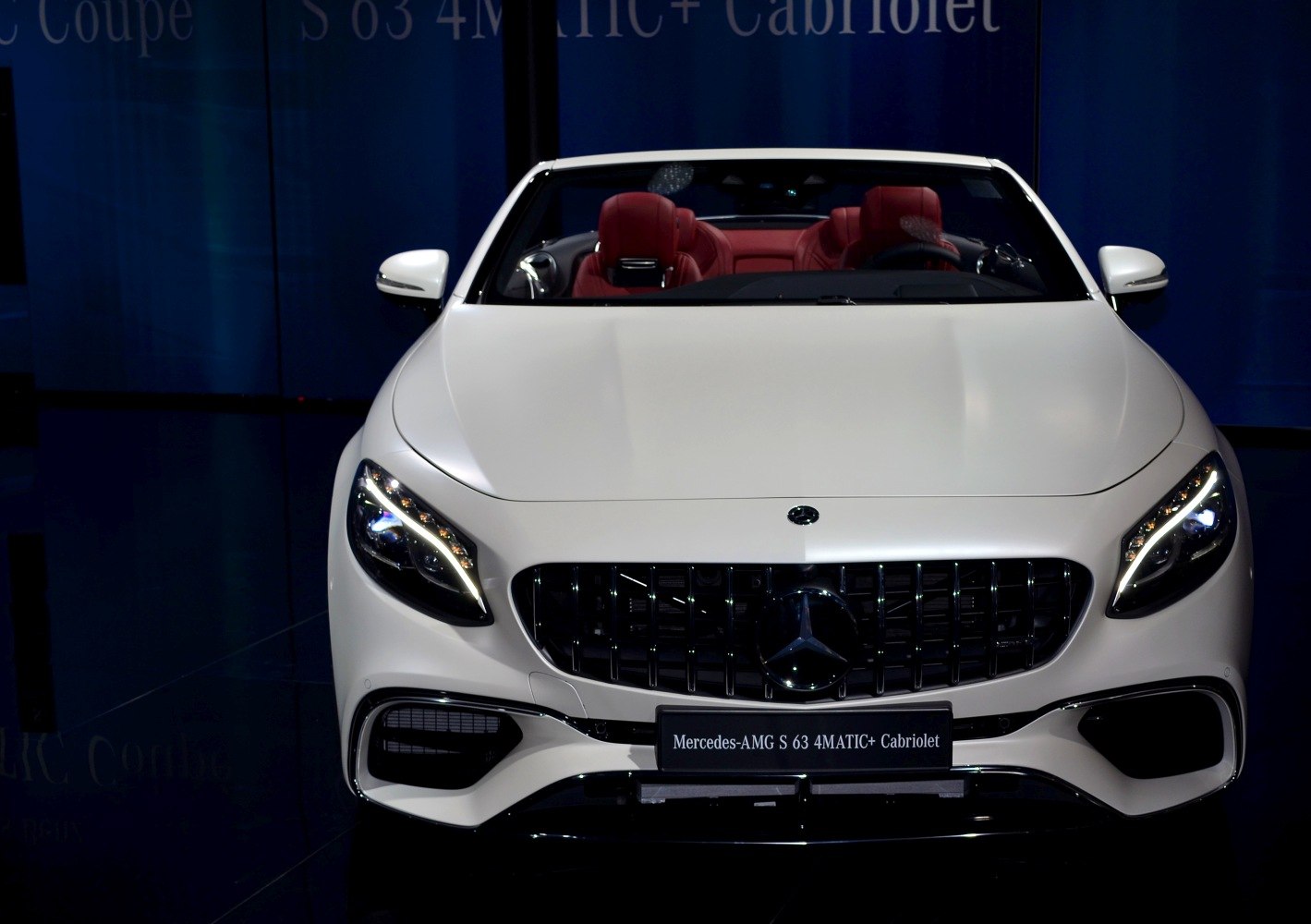 Front grille and LED headlights of a luxury convertible car