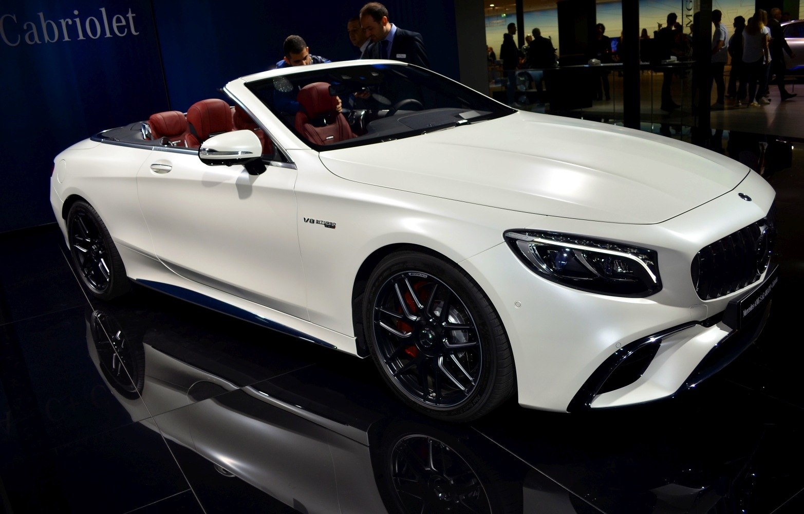 White convertible with V8 biturbo engine and black rims
