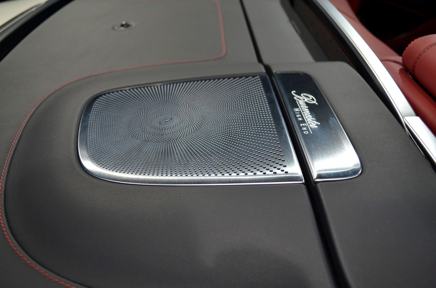 Burmester high-end speaker grille in luxury car interior