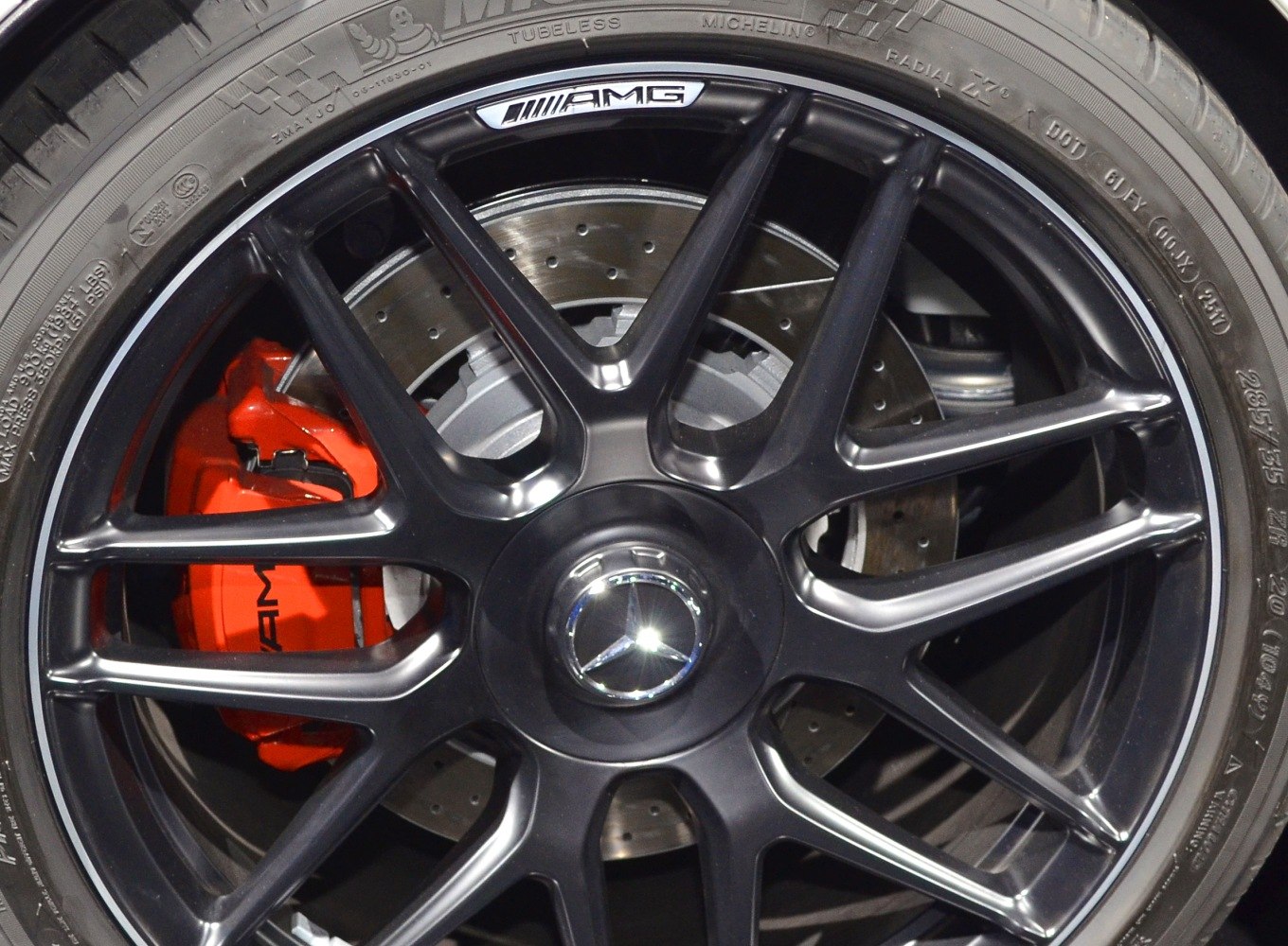 AMG black multi-spoke alloy wheel with red brake caliper