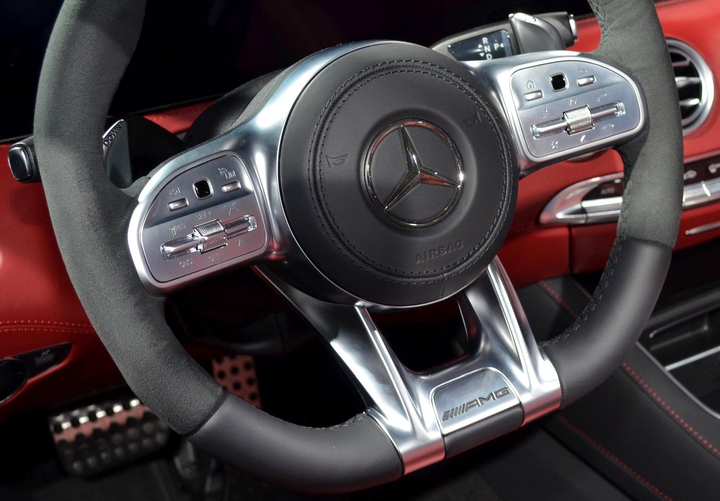 AMG steering wheel with control buttons and leather trim