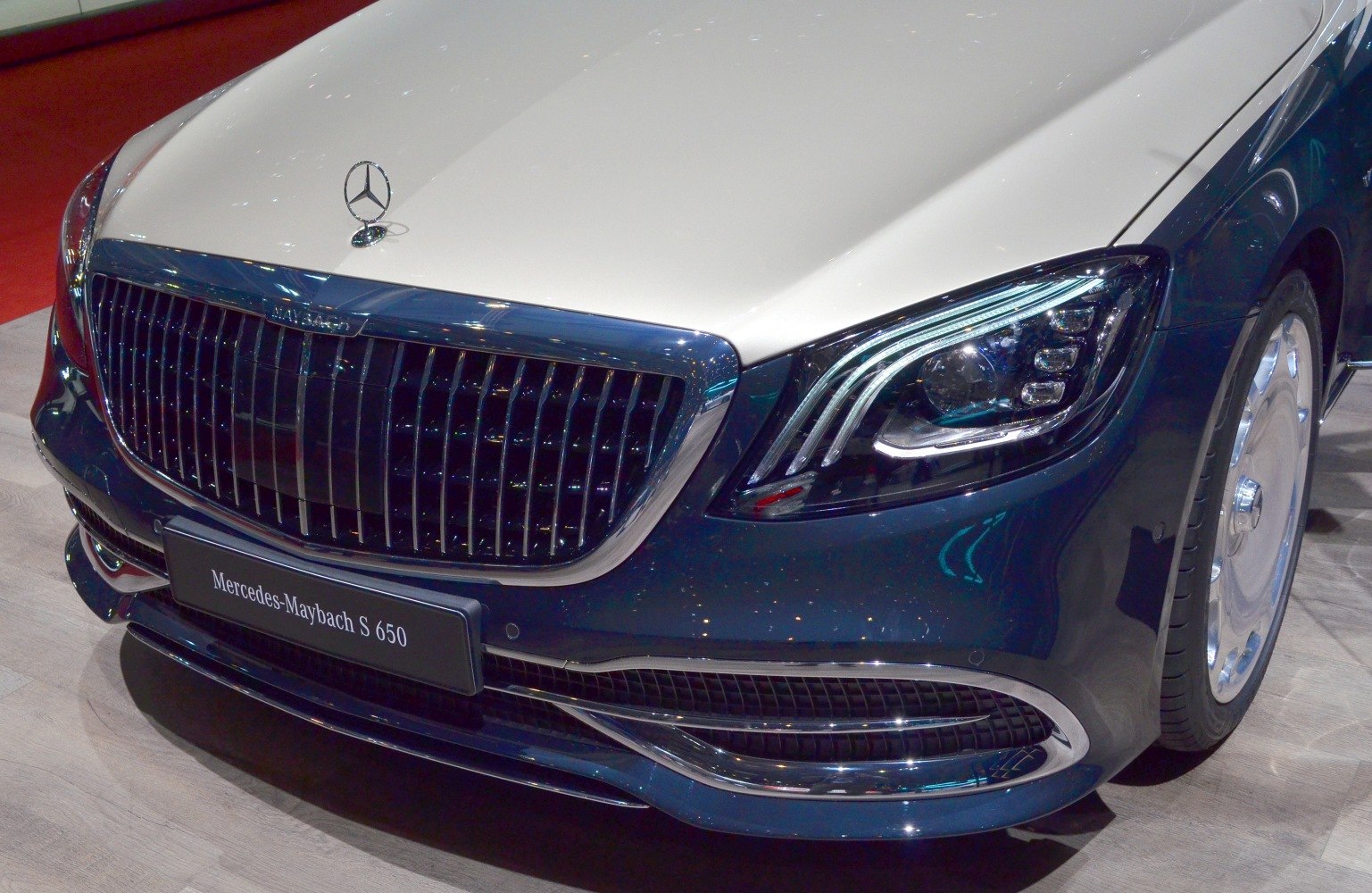 Close-up of luxurious front grille and LED headlight assembly