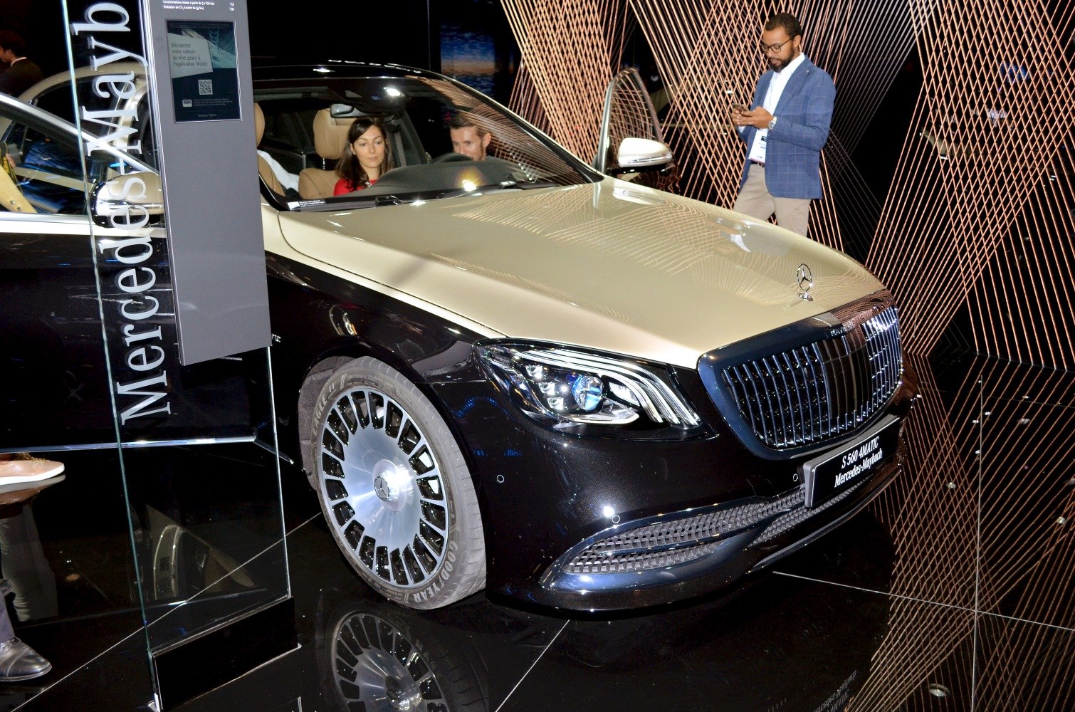 Luxury sedan front with LED headlights and distinctive grille