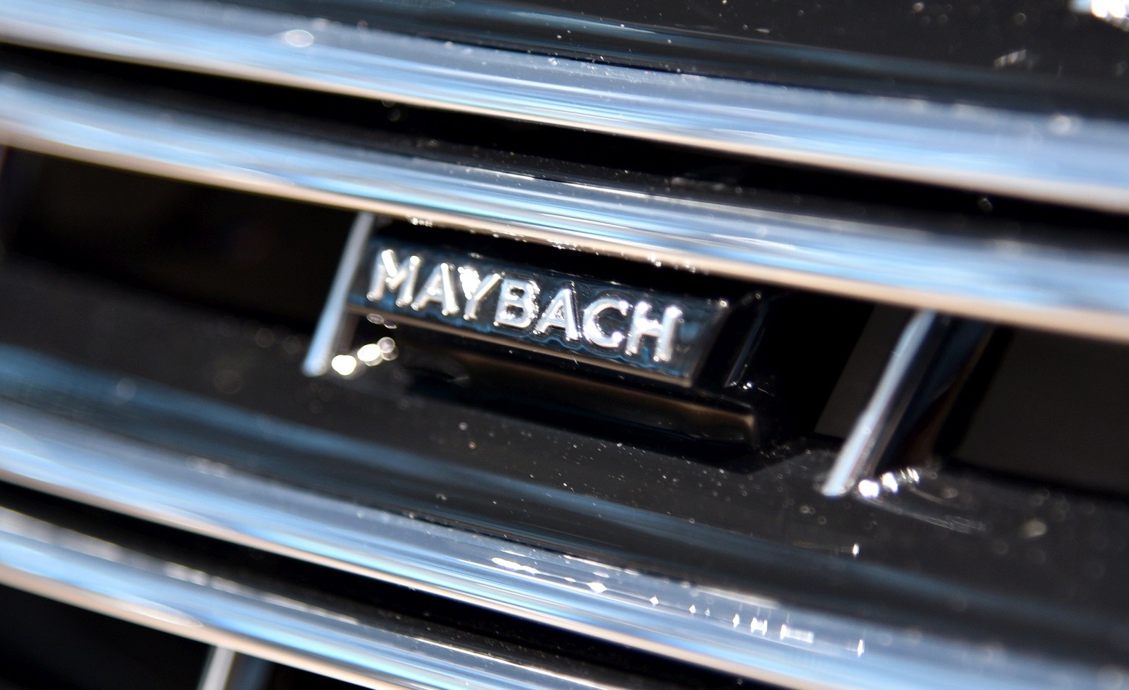 Close-up of Maybach emblem on chrome grille
