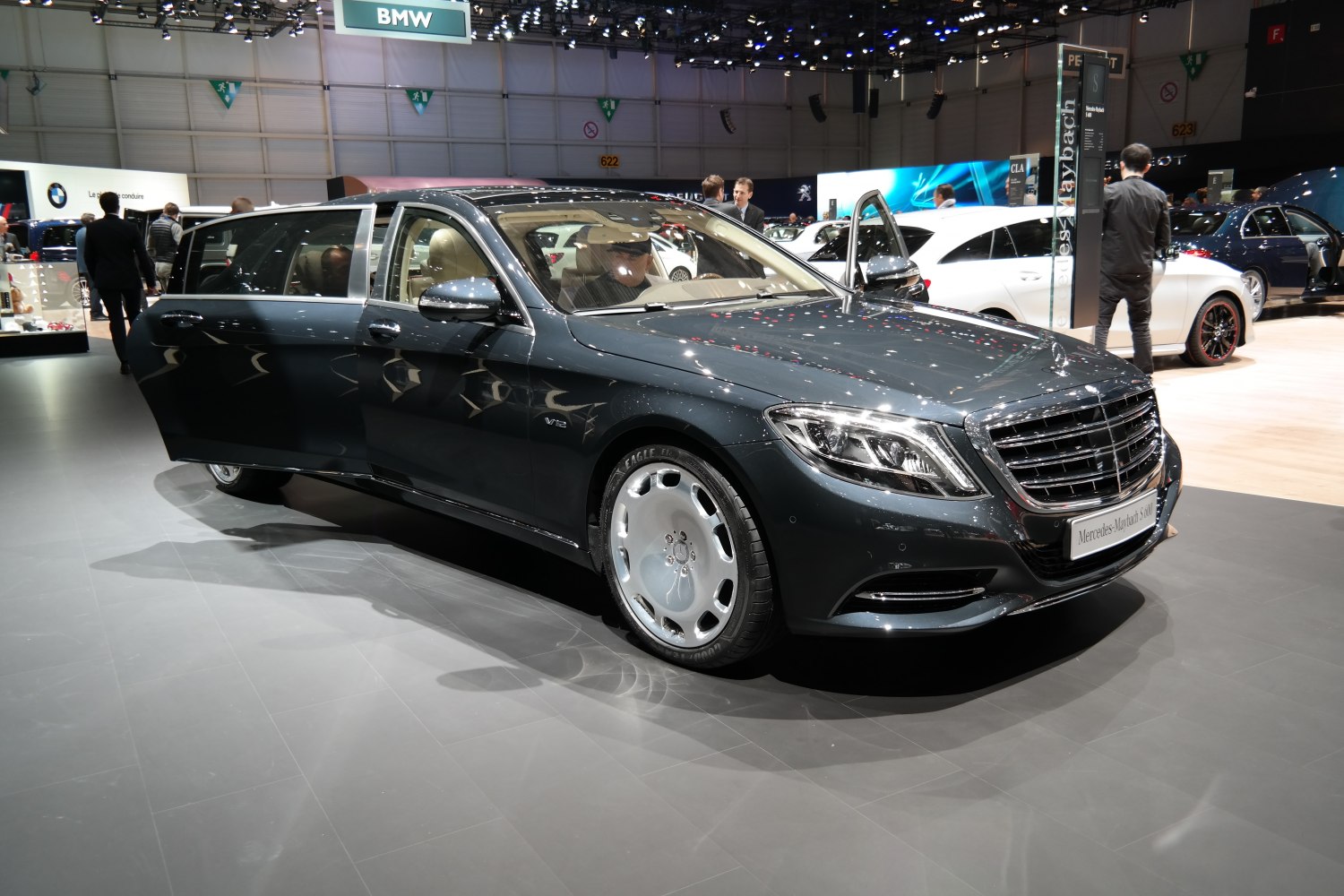 Luxury stretch limousine with V12 badge and signature grille