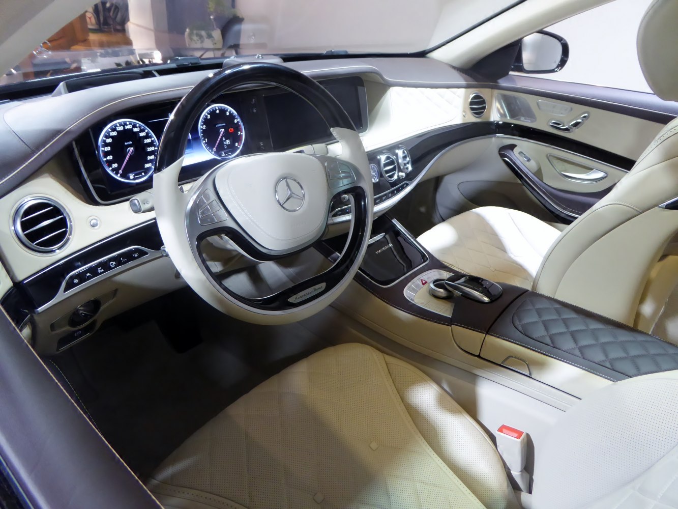 Luxury steering wheel and advanced digital dashboard in a premium car interior