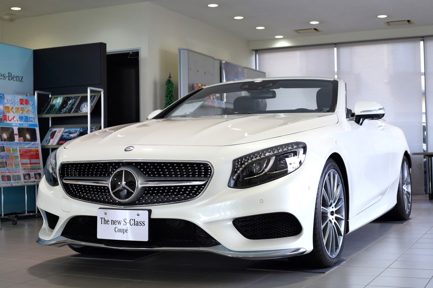 Front grille and LED headlights of a luxury convertible