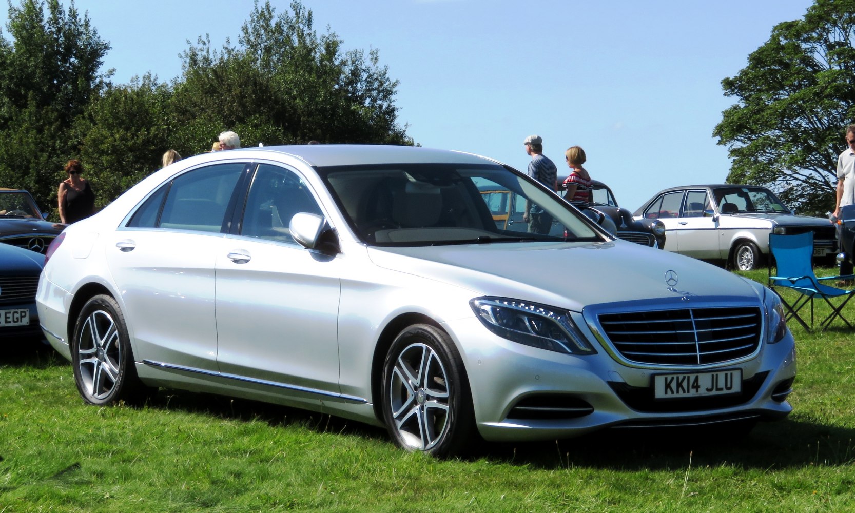 Luxury sedan front side with LED headlights and aerodynamic design