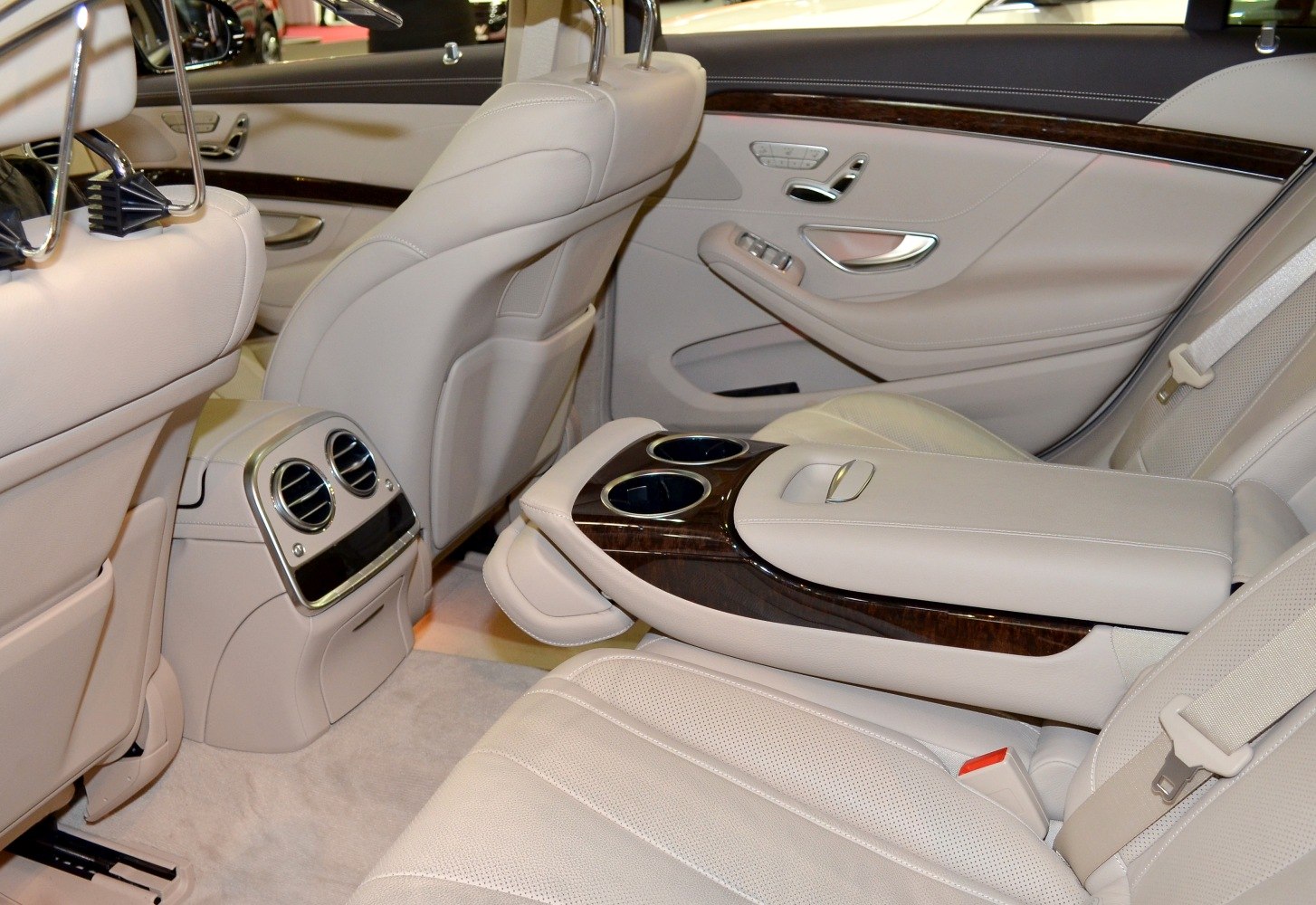Luxury rear seat interior with leather upholstery and wood trim