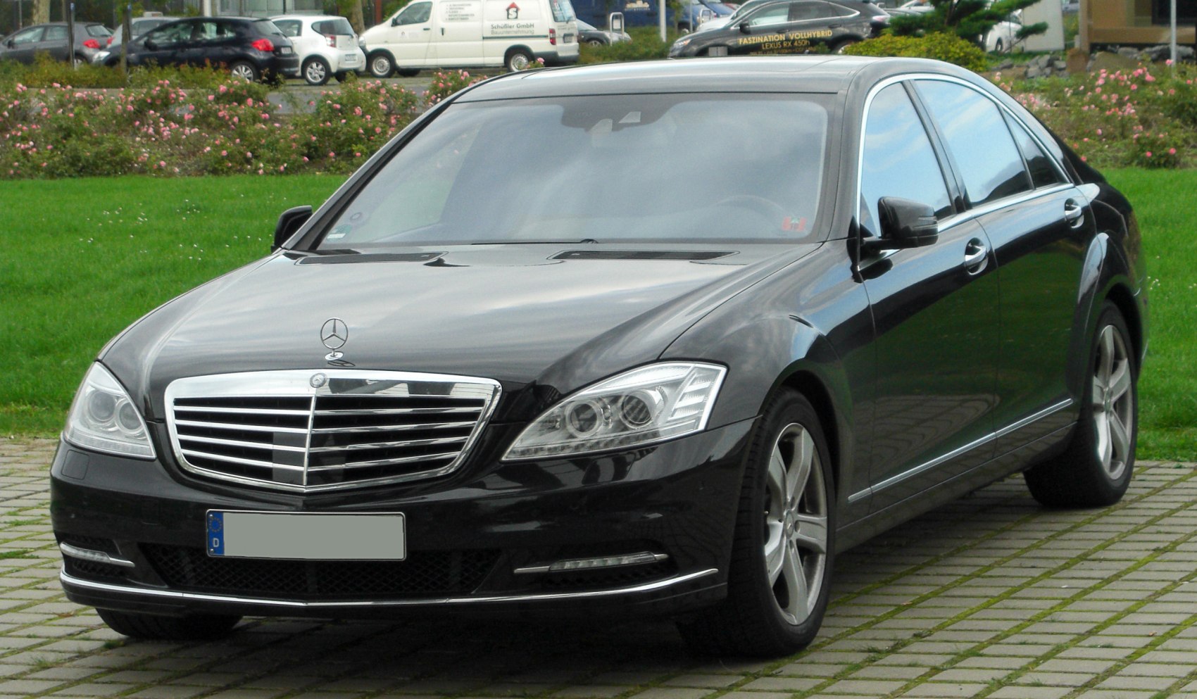 Front grille and LED headlights of luxury sedan