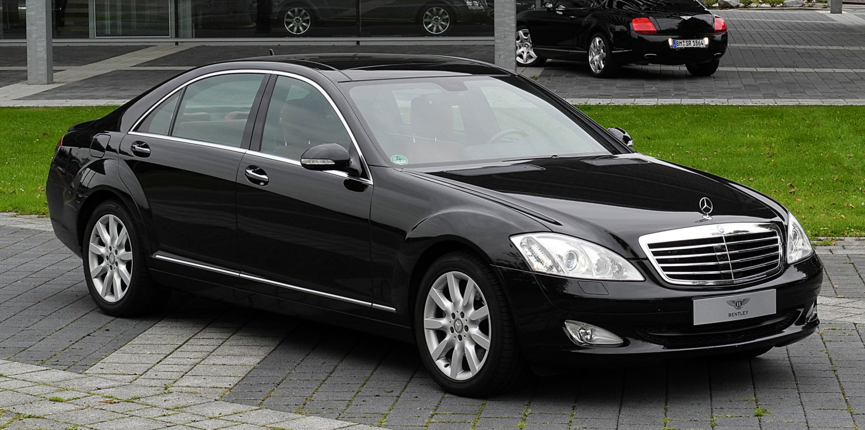 Luxury sedan with sleek side profile and alloy wheels