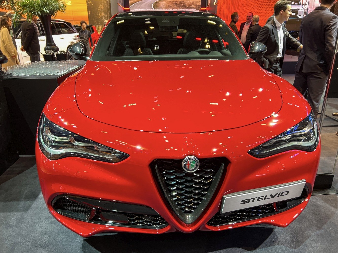 Sleek front view with triangular grille and LED headlights