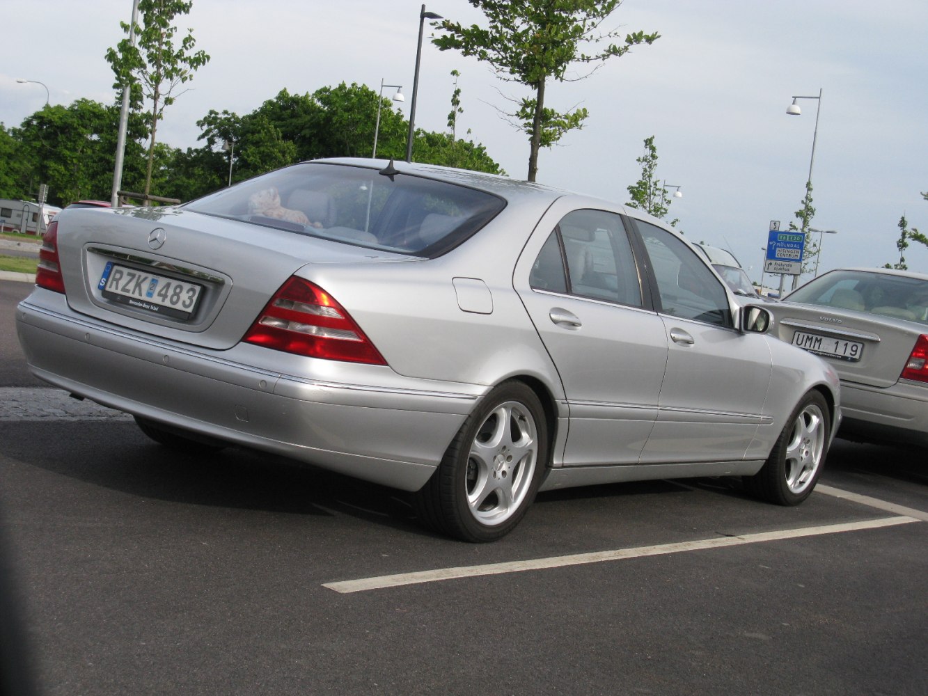 Rear side angle with distinctive tail lights and alloy wheels