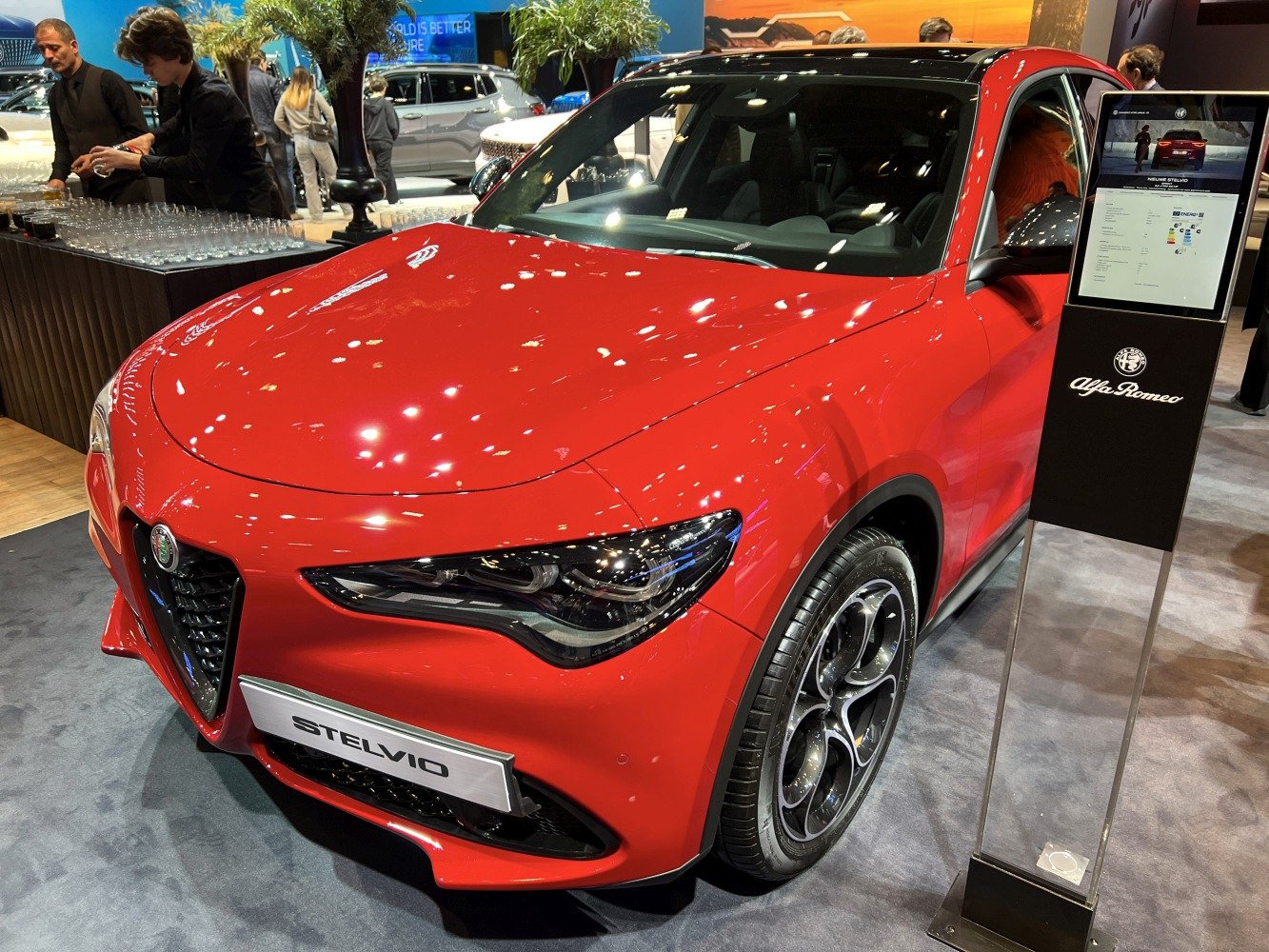Front fascia and alloy wheels of a red luxury SUV