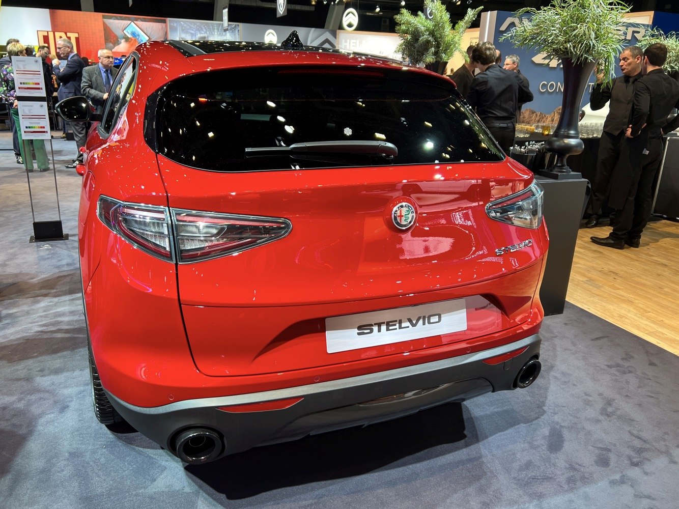 Red rear view with updated taillights and dual exhausts