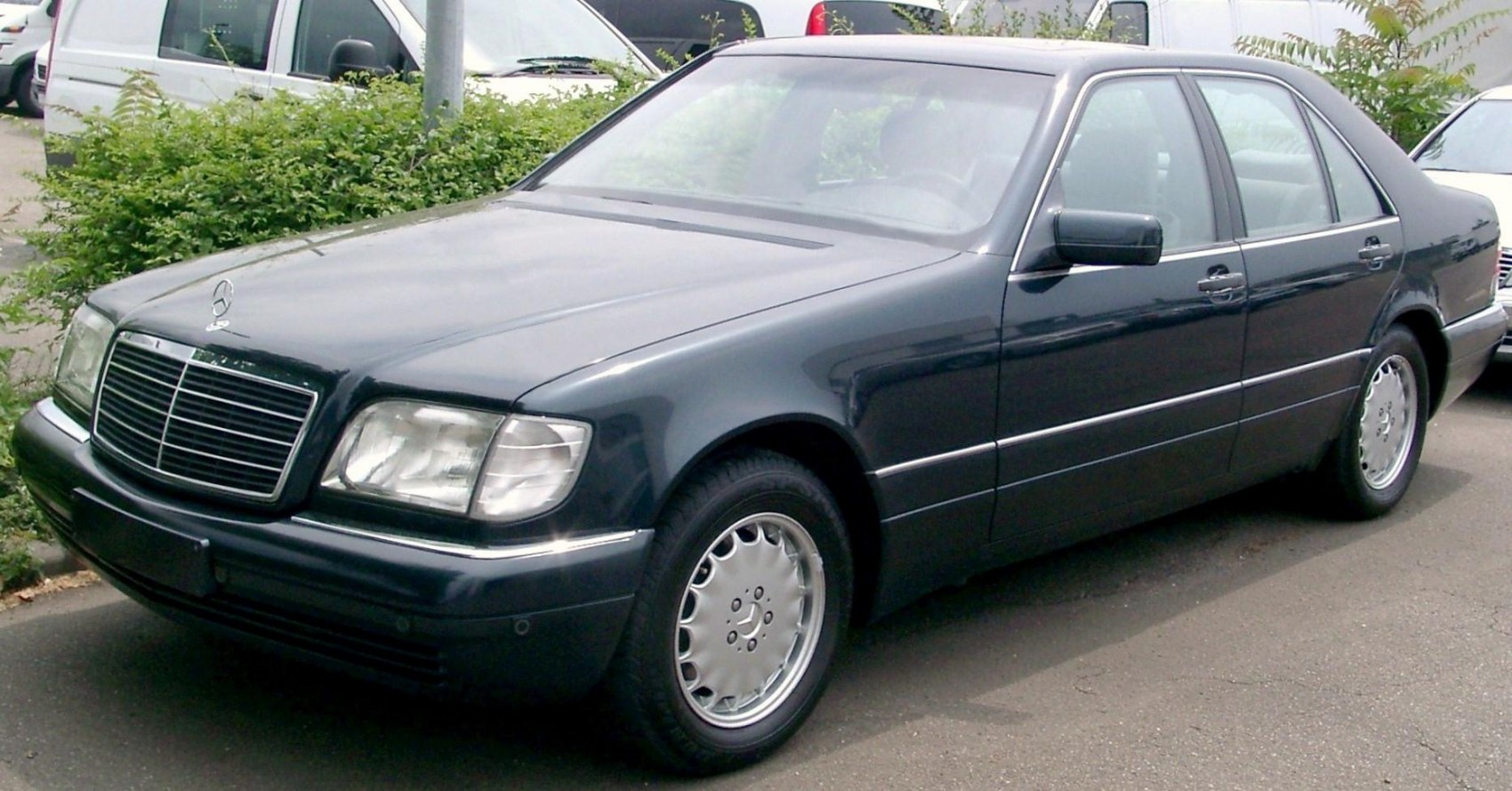 Luxury sedan with distinctive grille and alloy wheels from mid-1990s facelift model