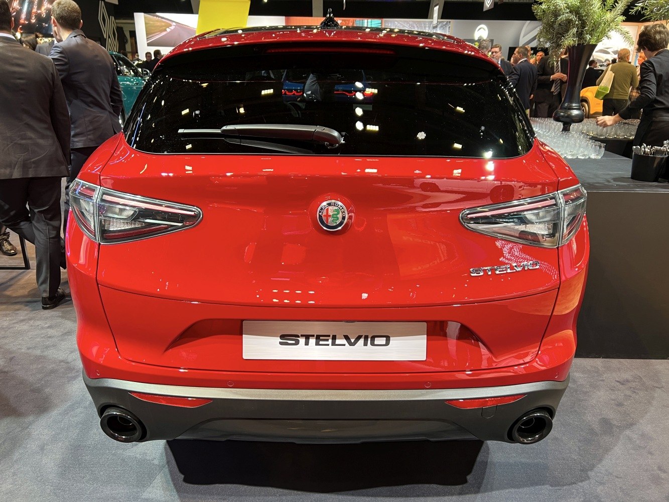 Rear view of sporty SUV with distinctive tail lights and dual exhaust pipes