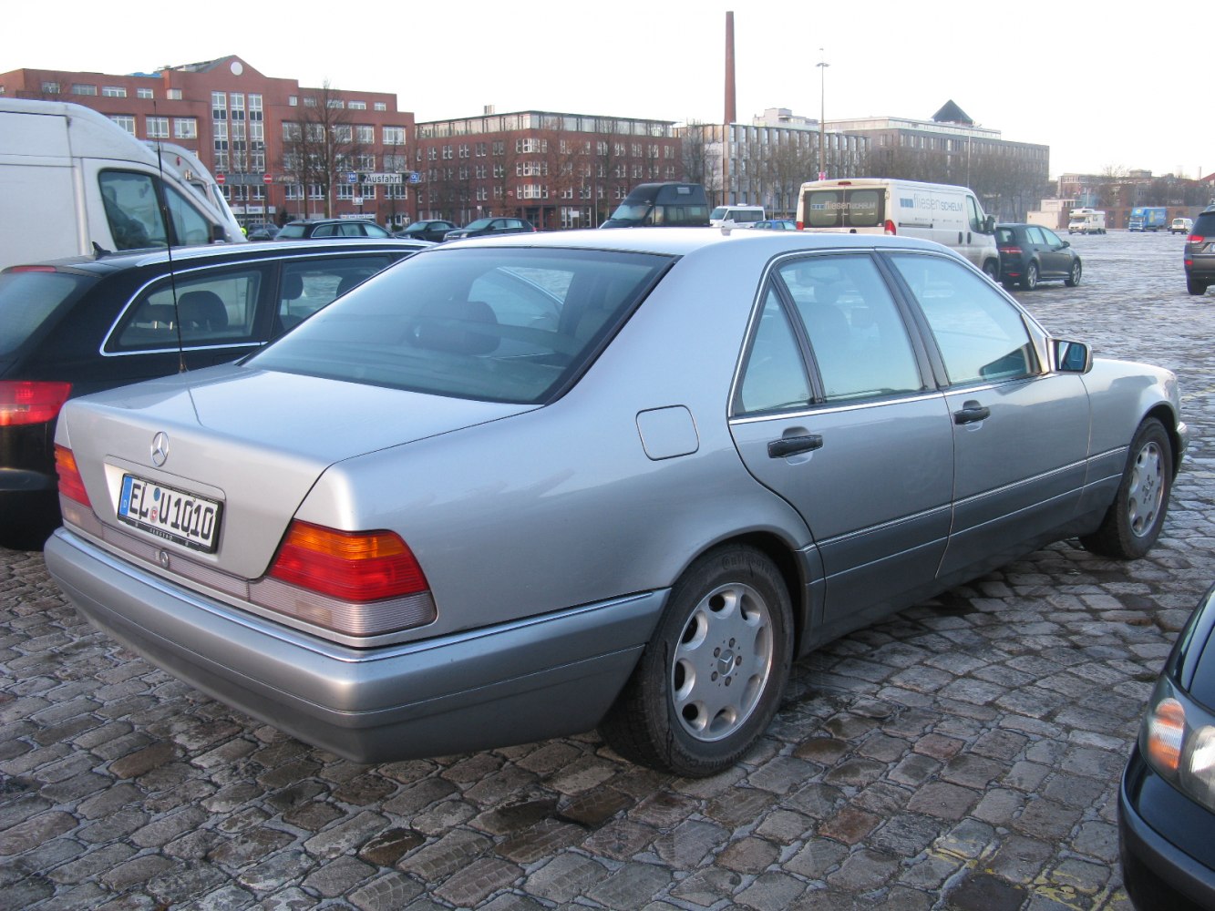 Rear side view of a classic luxury sedan
