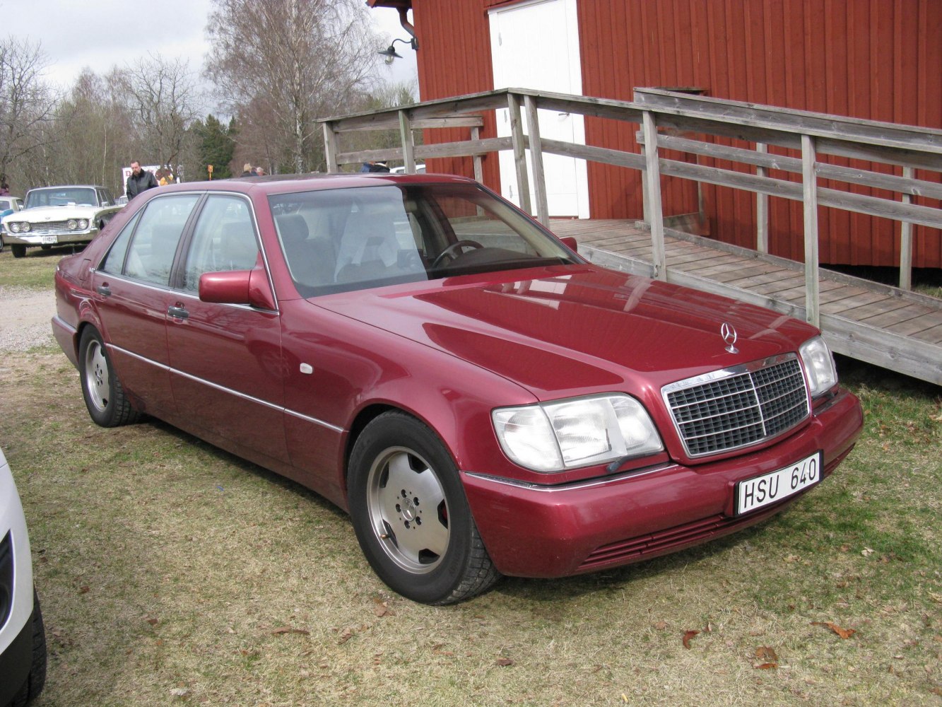 Luxurious sedan with square headlights and chrome grille