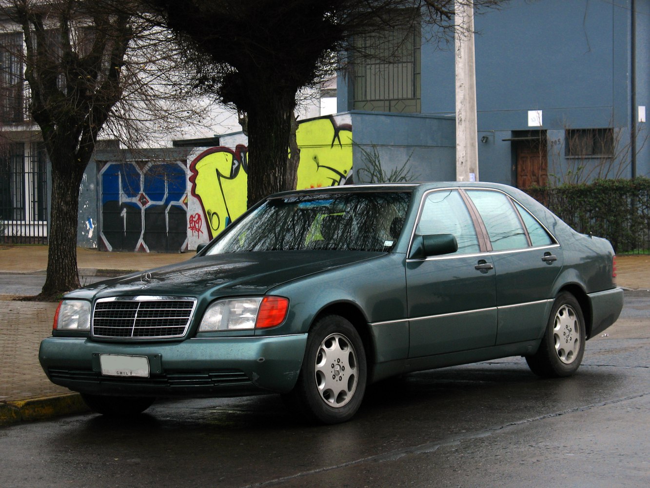 Classic luxury sedan with distinctive grille and rectangular headlights