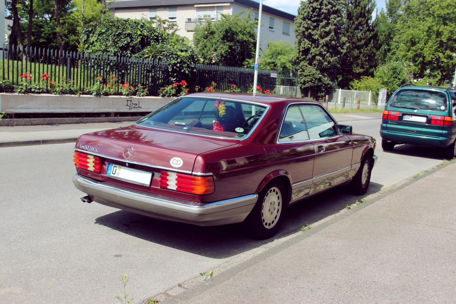Rear view of classic 1980s luxury coupe with distinctive taillights and chrome trim