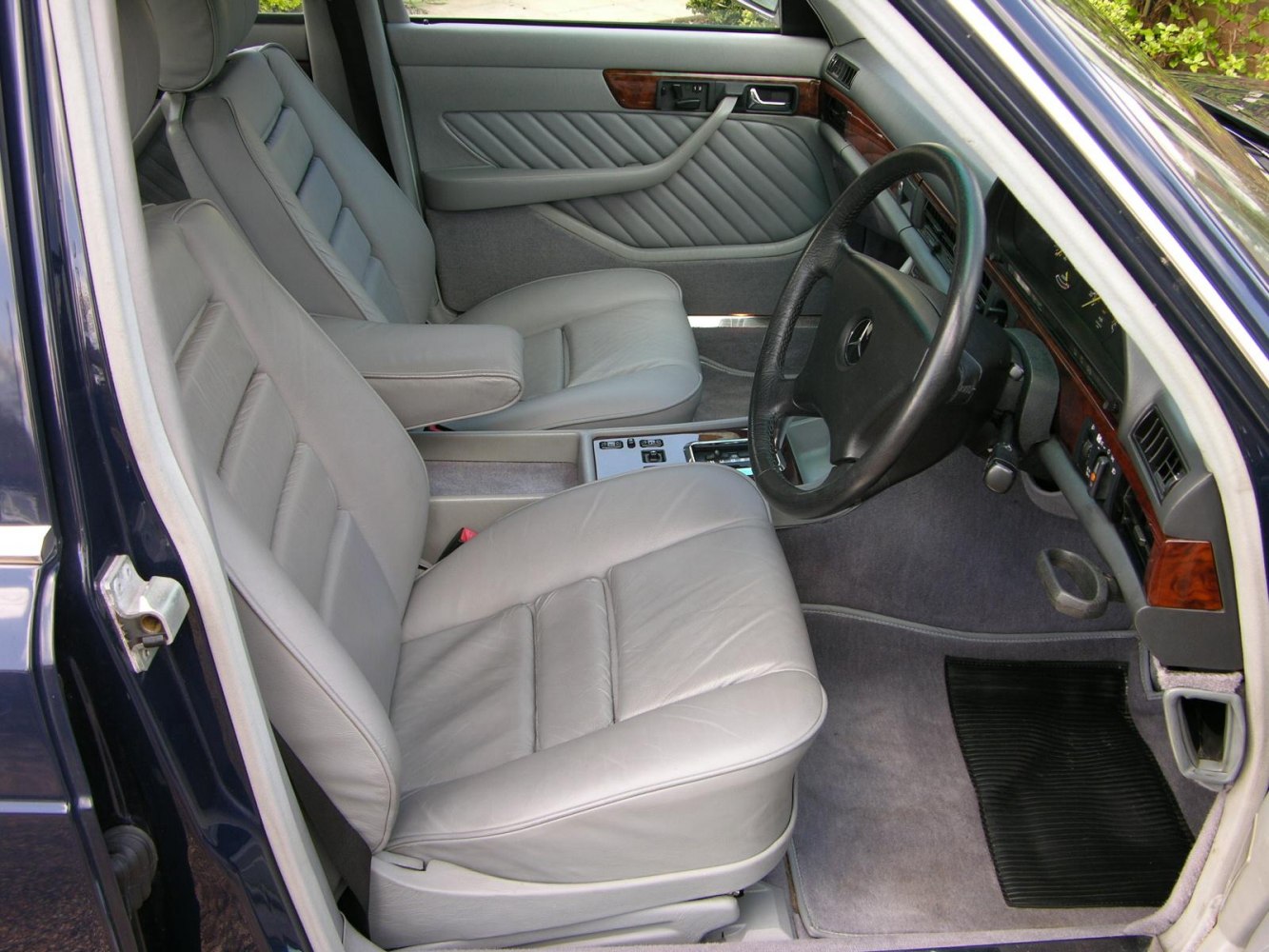 Leather seats and wood trim classic 1980s luxury car interior