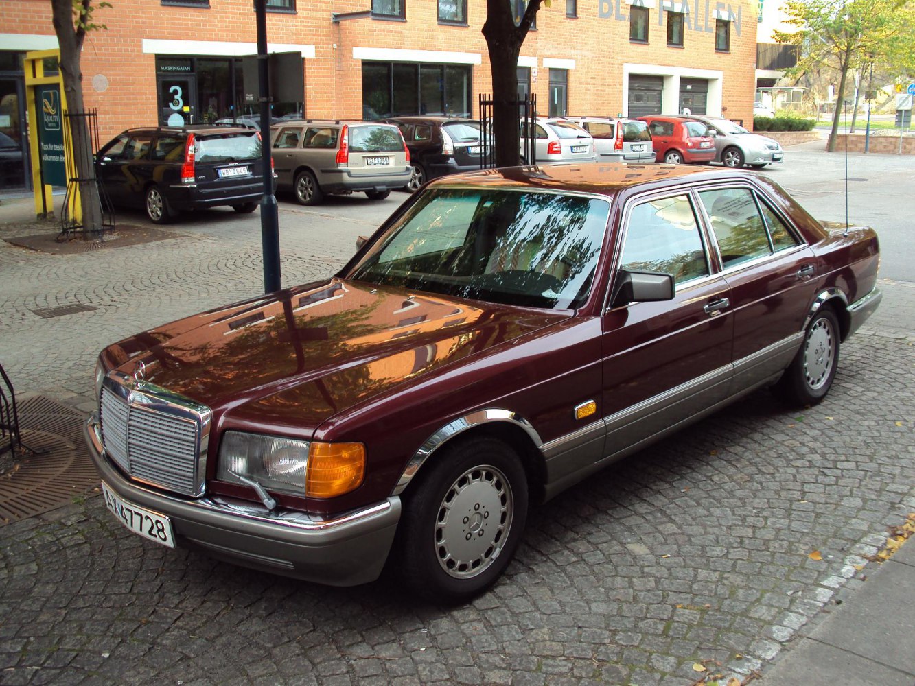 Classic vintage sedan with chrome front grille and rectangular headlights