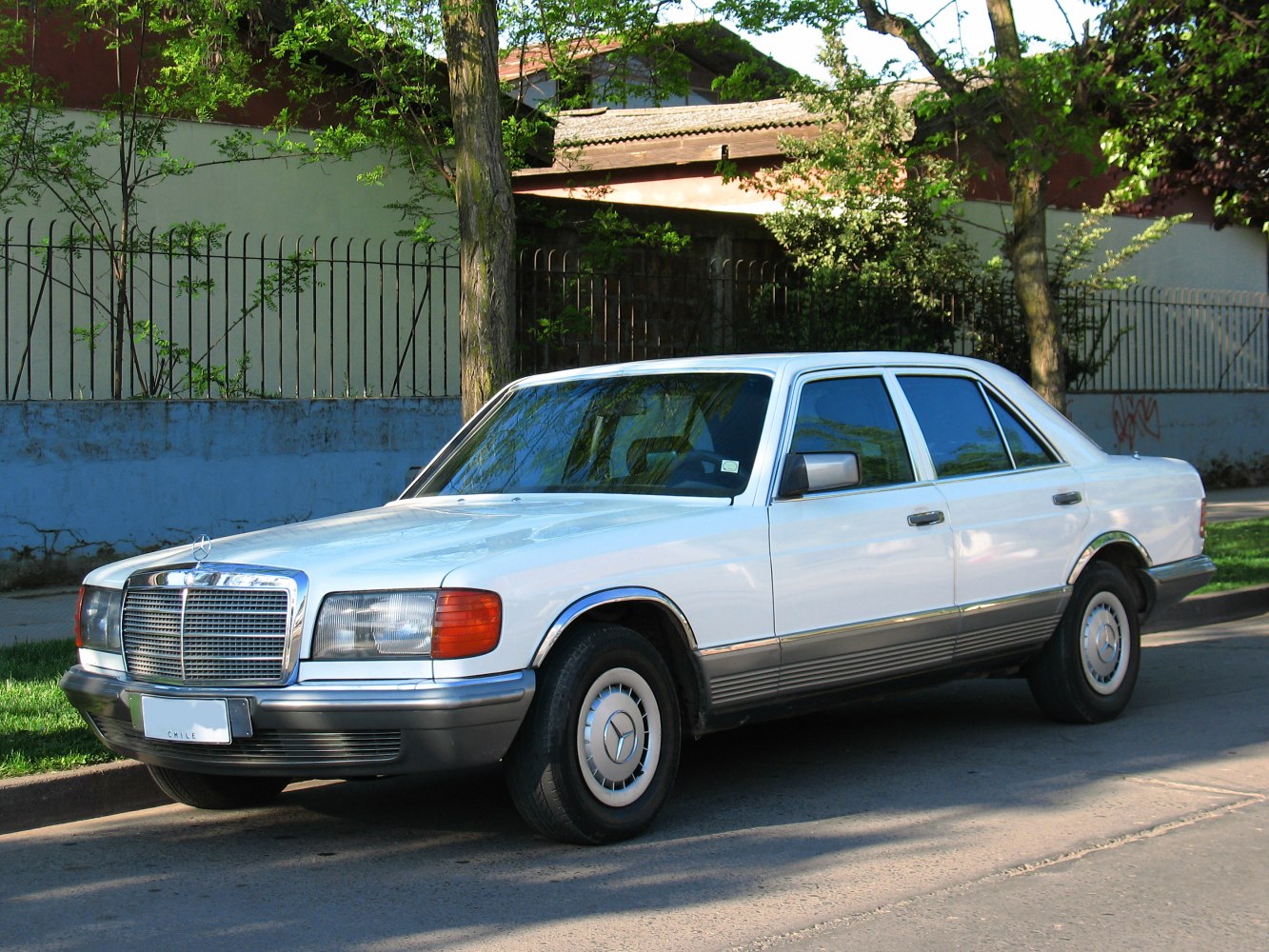 Classic luxury sedan with distinctive grille and rectangular headlights