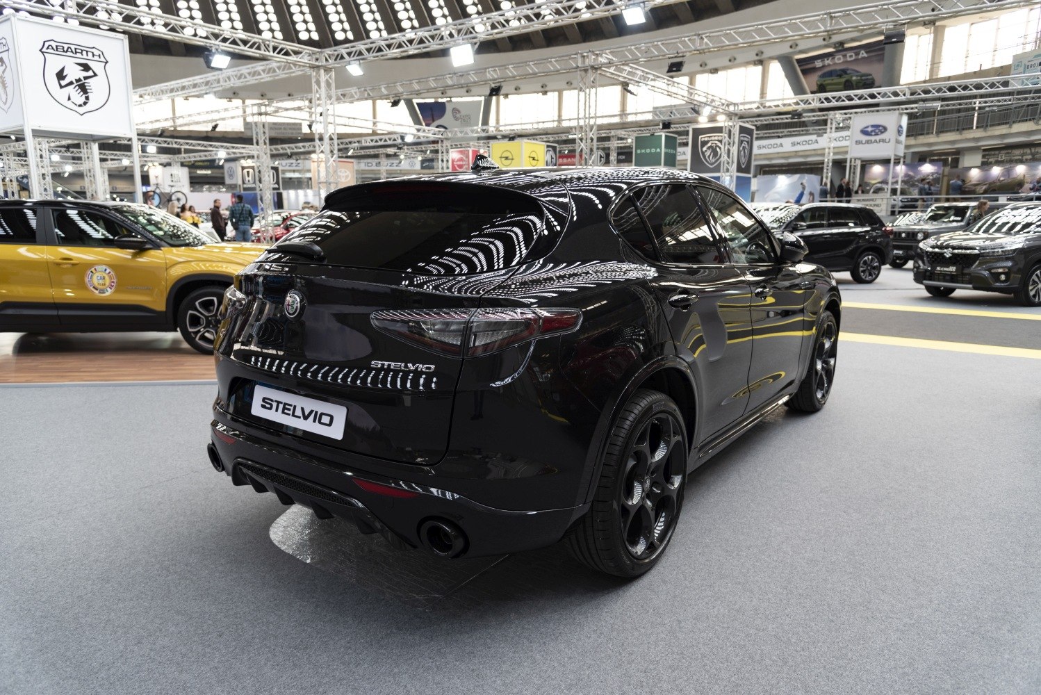 Sleek rear design with distinctive tail lights and dual exhausts