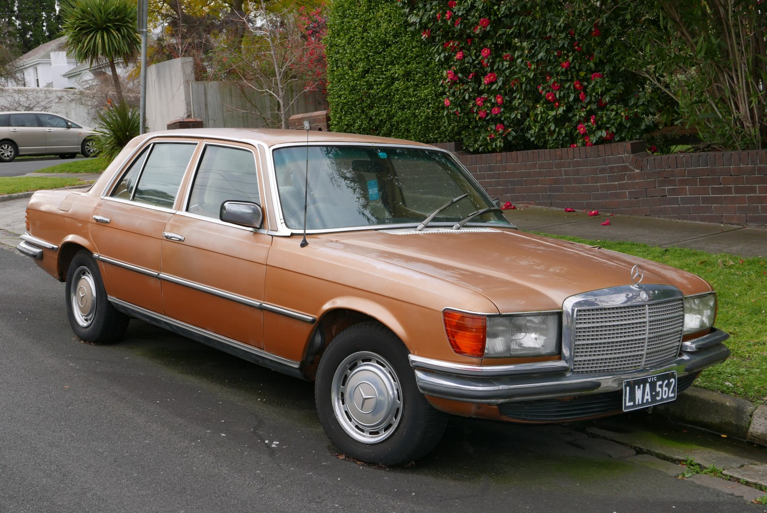 Classic vintage sedan with rectangular headlights and chrome grille