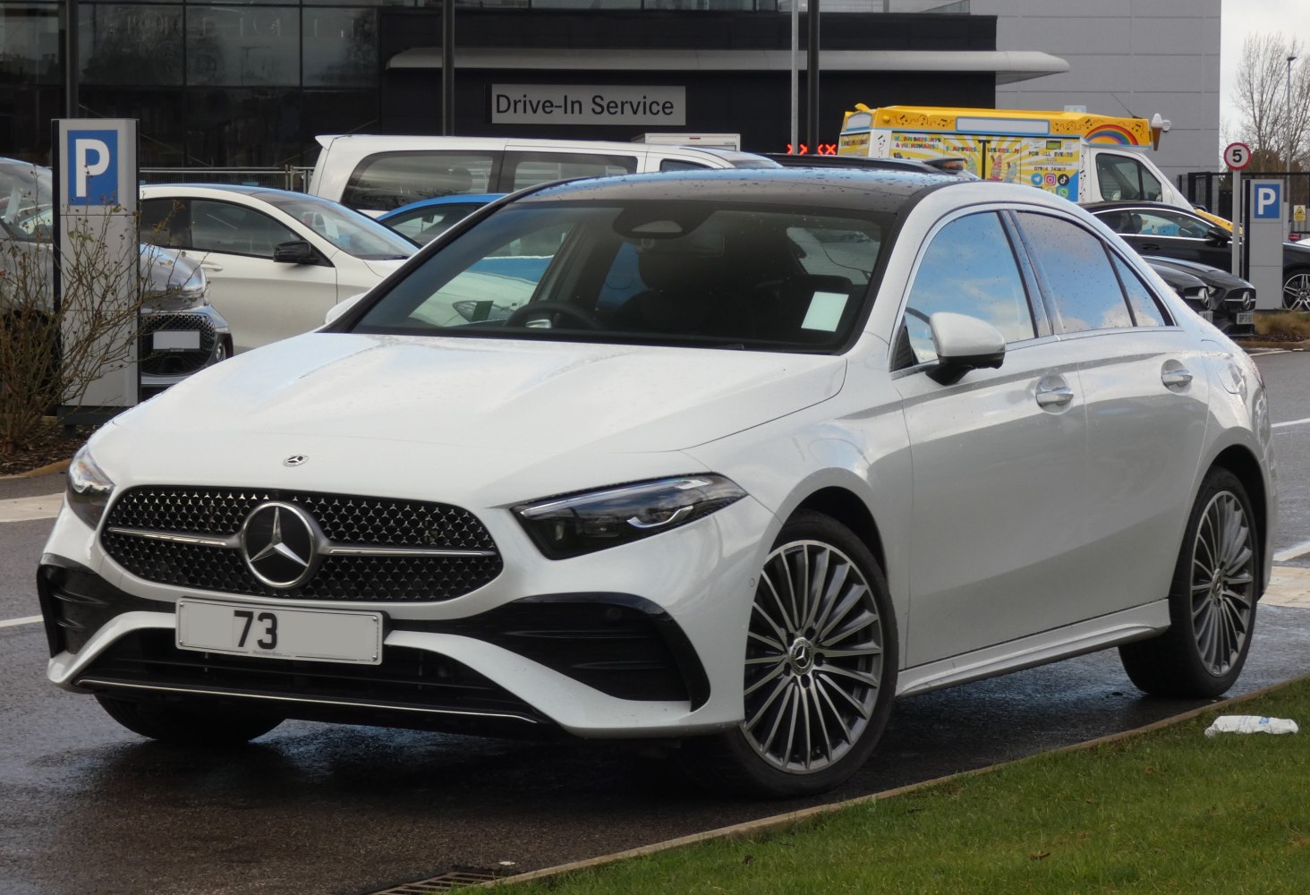 Front exterior with LED headlights and distinctive grille.