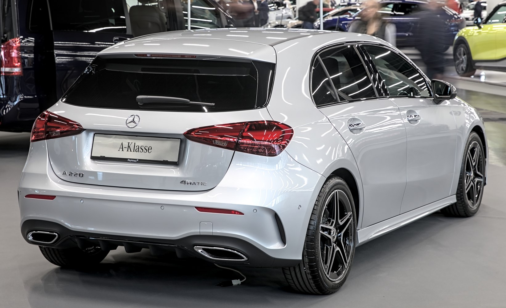 Rear hatchback with 4MATIC badge, LED taillights, dual exhaust tips