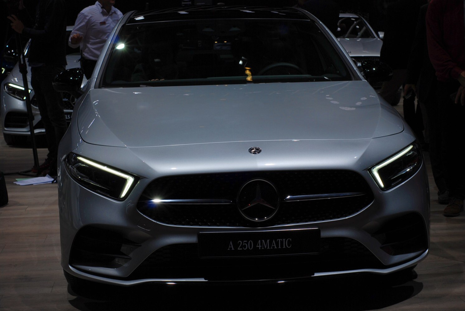 Front view with signature LED headlights and grille