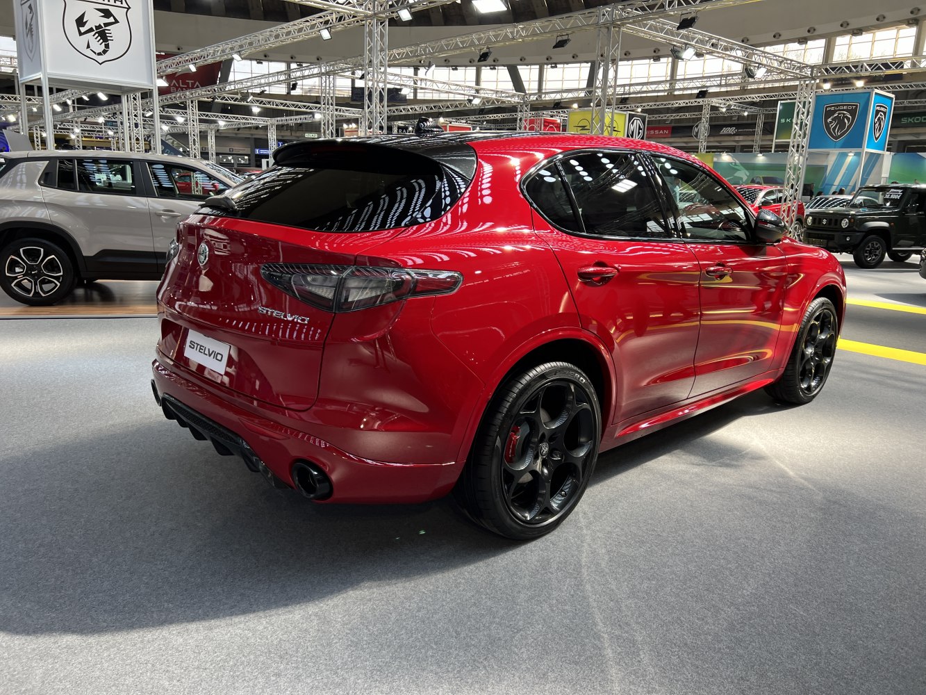 Rear side view with black alloy wheels of sporty luxury SUV