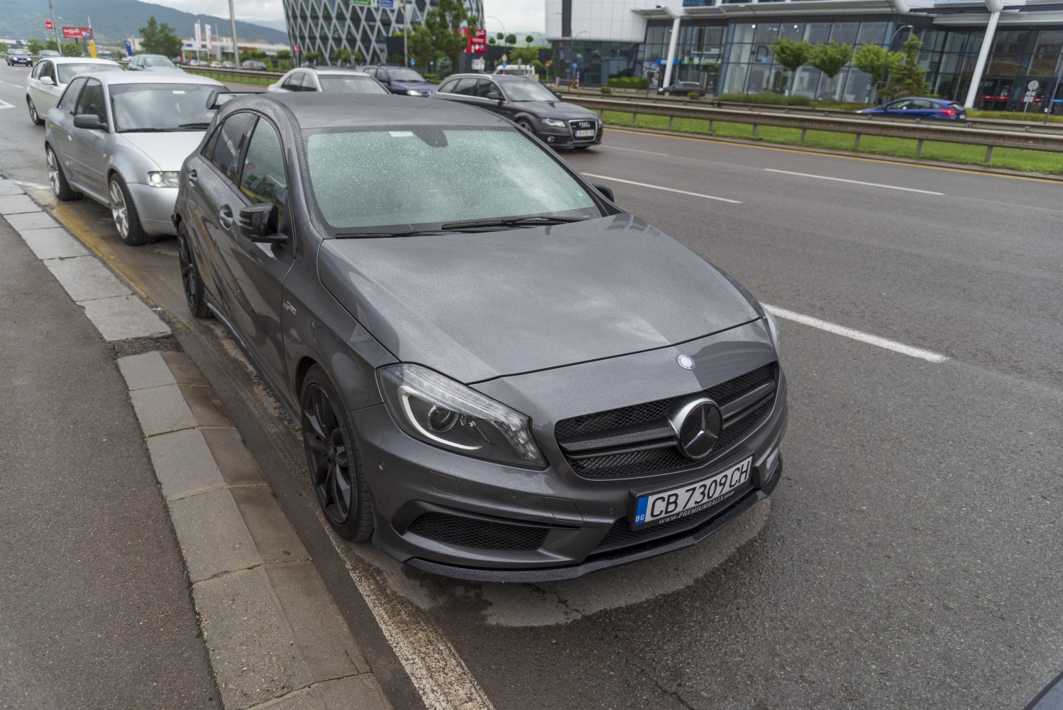 Front view of a facelift Mercedes A-Class with AMG grille and headlights