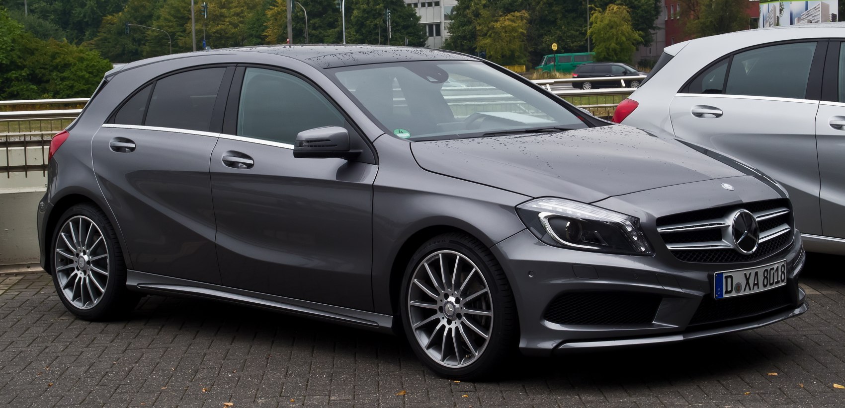 Grey 5-door hatchback with alloy wheels and front side profile