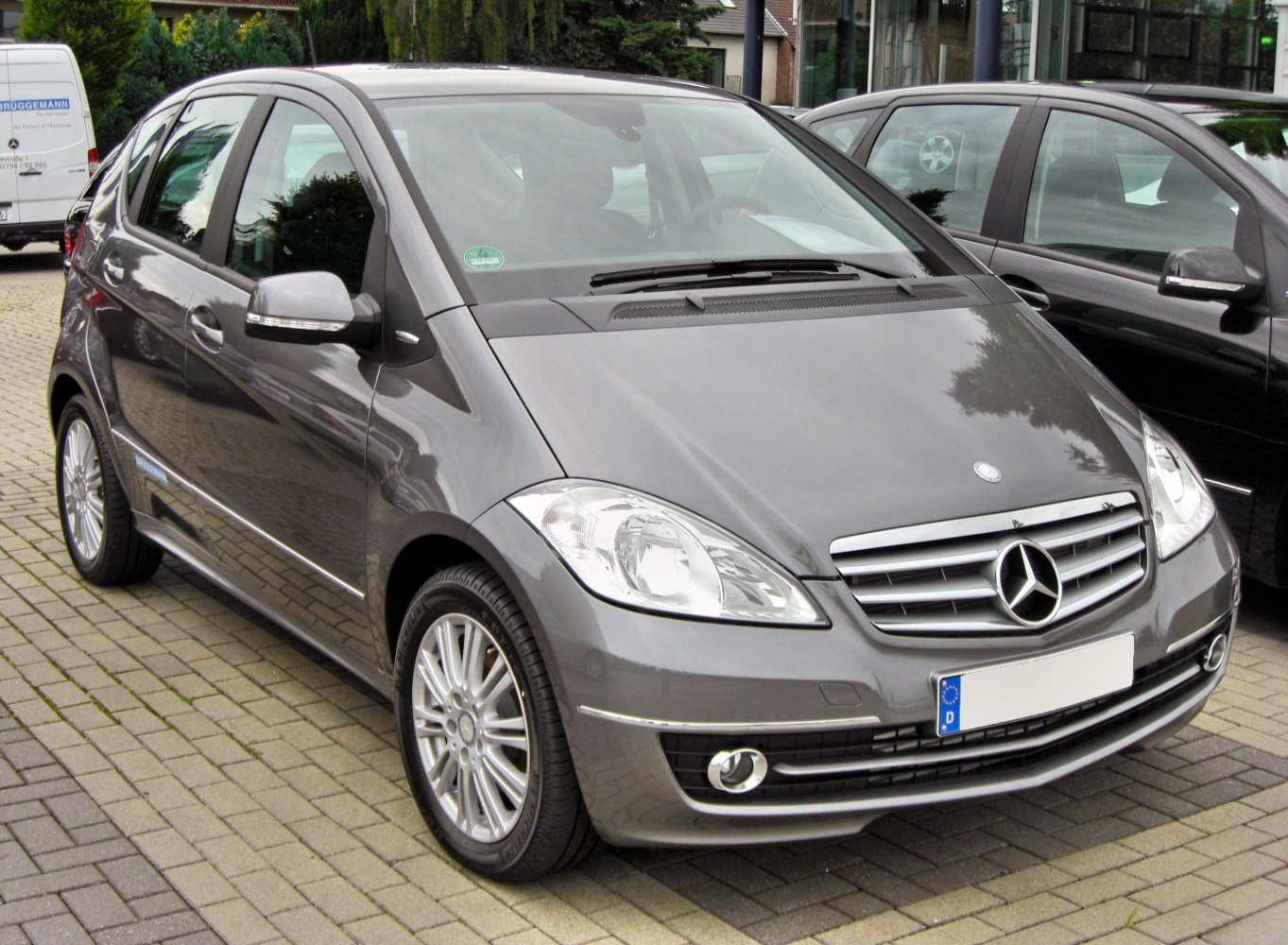 Gray hatchback with distinct Mercedes grille and alloy wheels