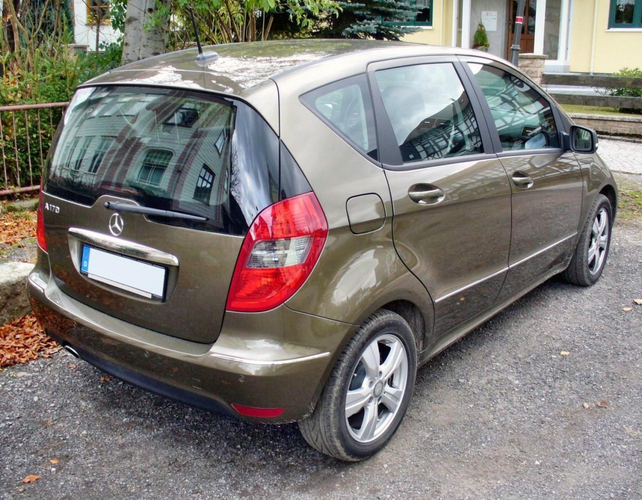 Rear and side hatchback view with alloy wheels