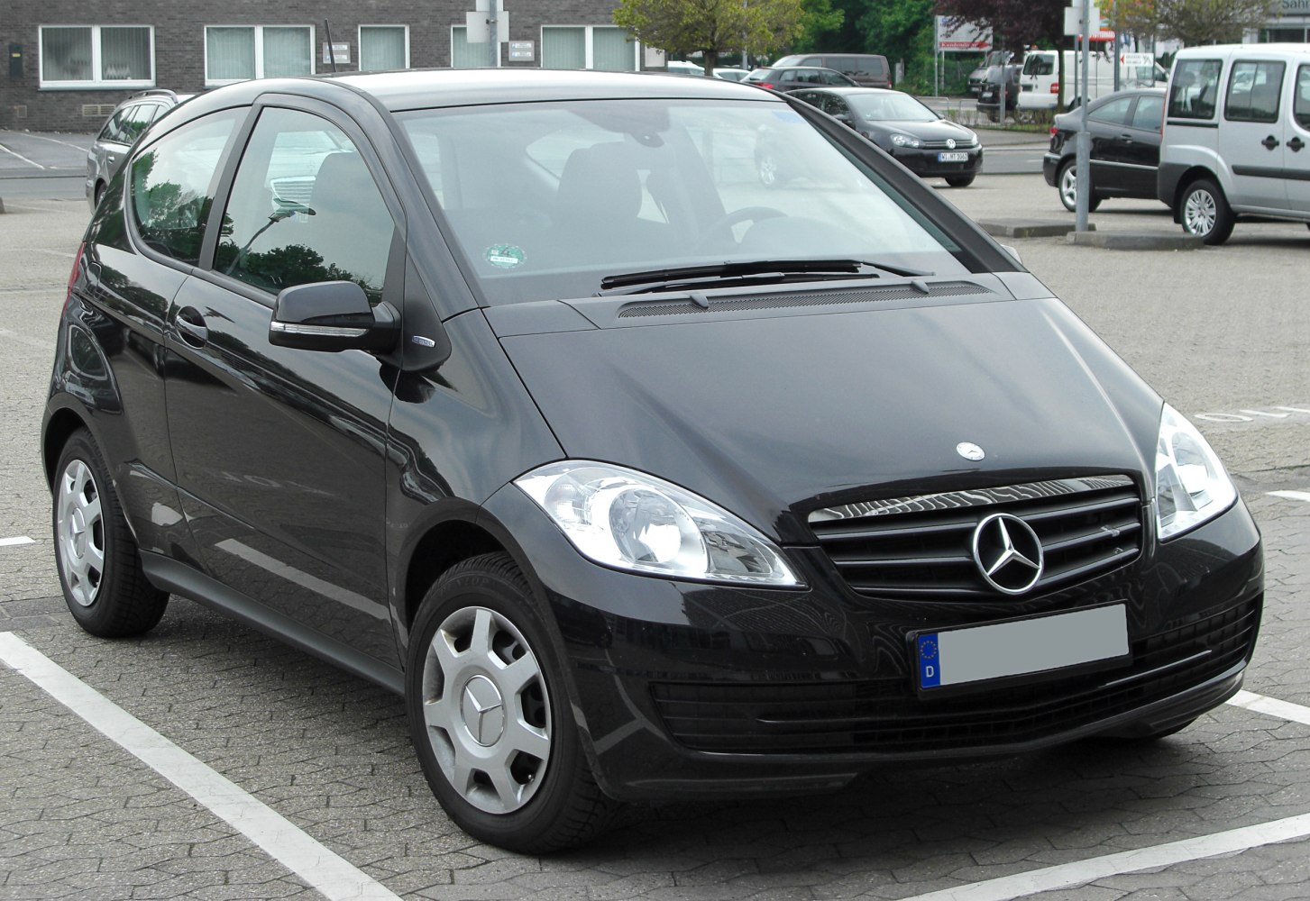 Front view with distinctive headlights and prominent grille