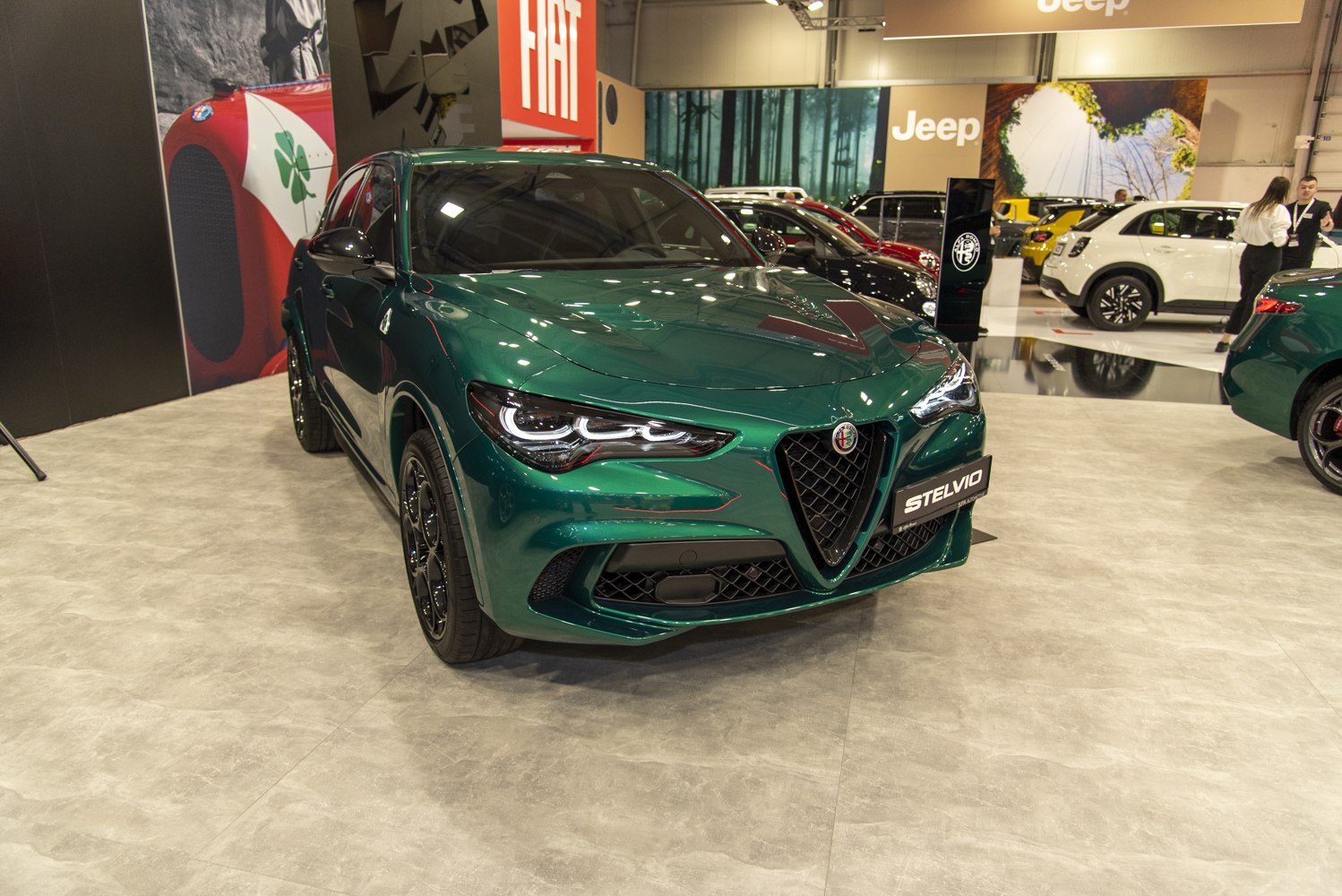 Sleek front fascia with distinct Alfa Romeo triangular grille and modern LED headlights.
