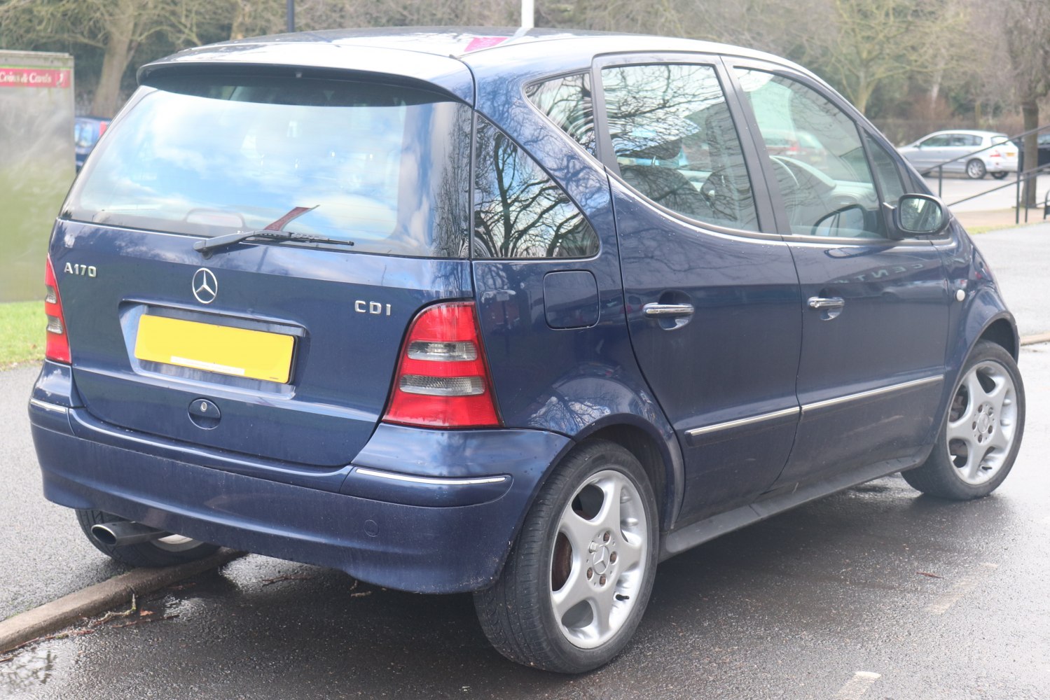 Rear view showcasing taillights and alloy wheels