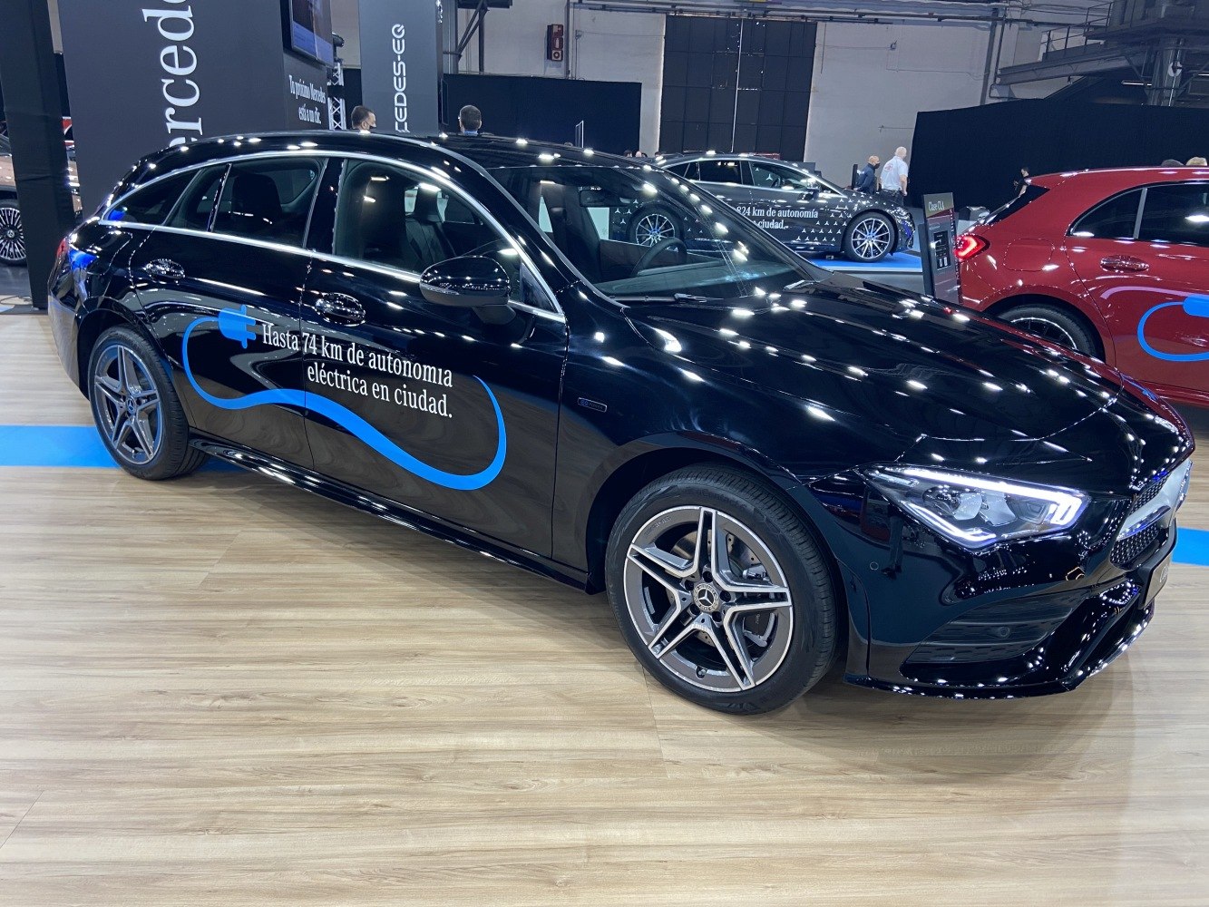 Electric range decal on black station wagon with LED headlights and alloy wheels