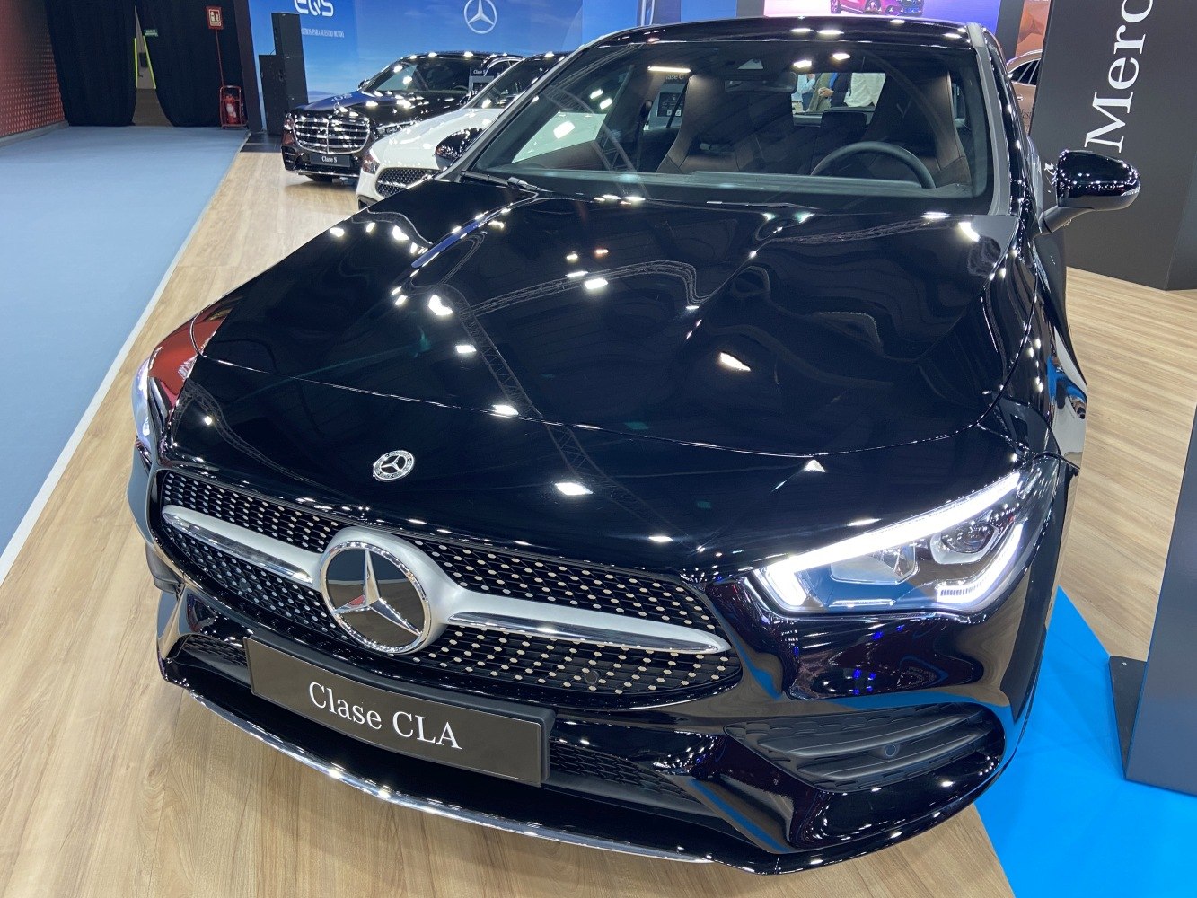 Front grille and LED headlights of a modern luxury vehicle