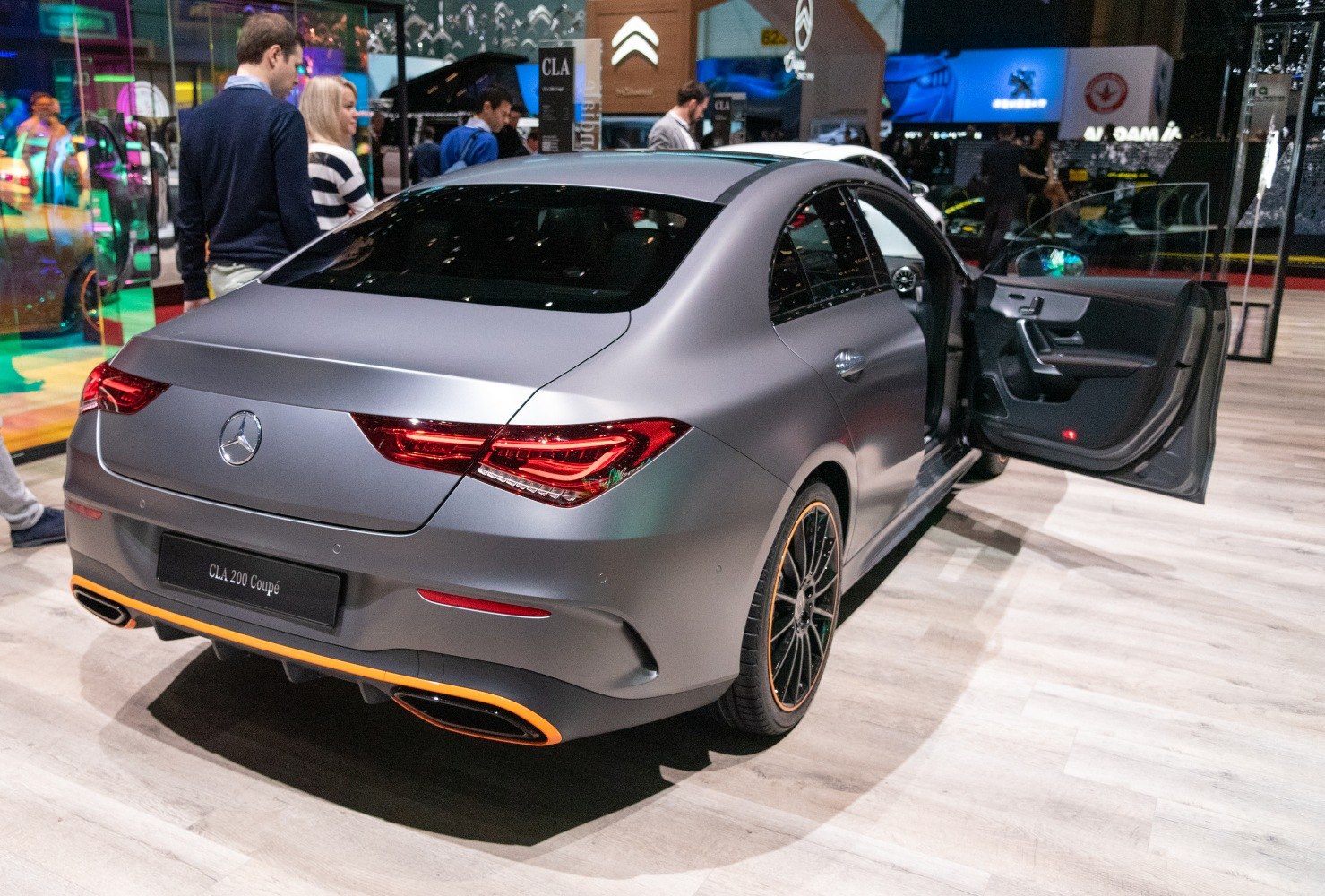 Sleek rear design with LED taillights and black multi-spoke wheels