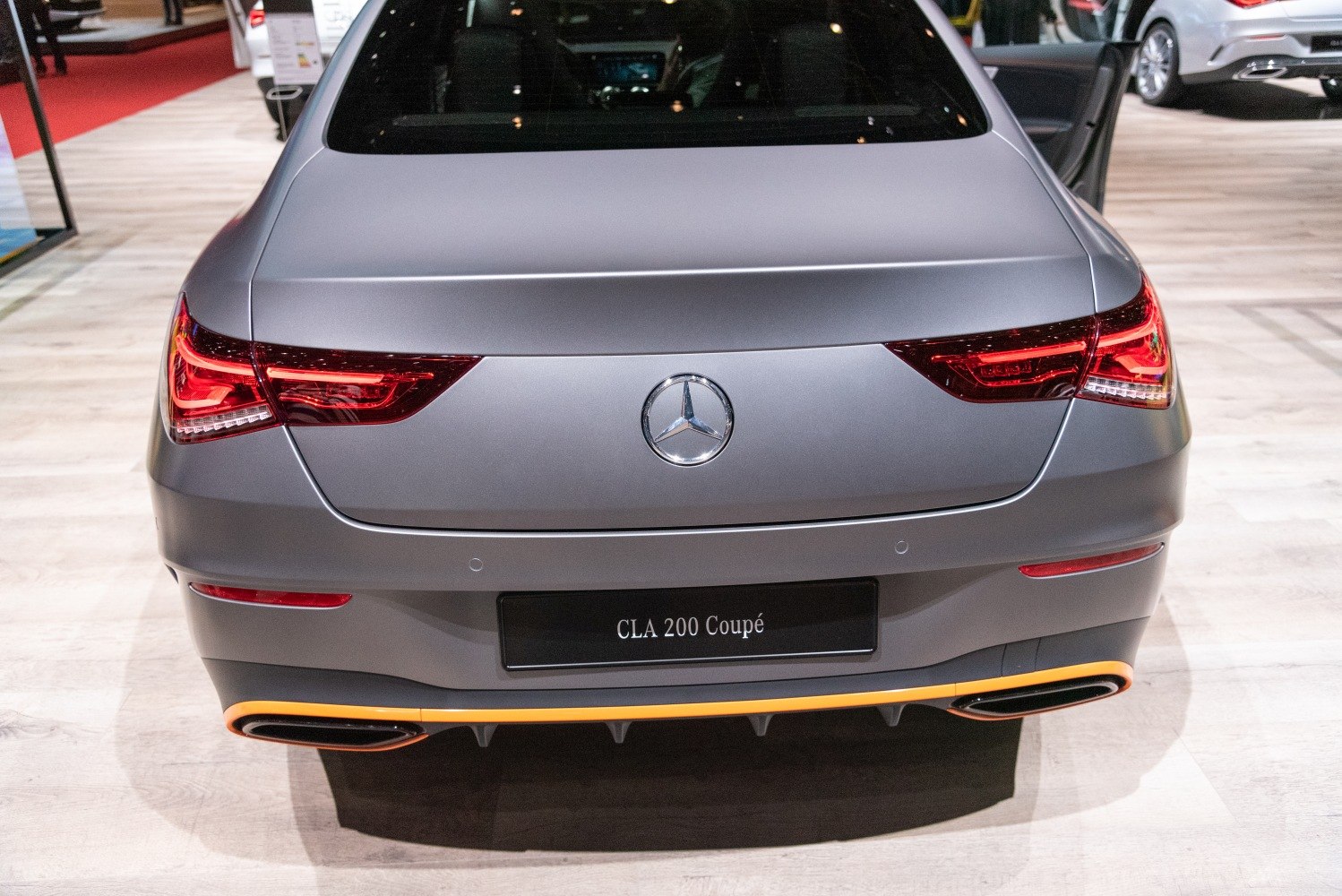 Rear view with LED tail lights and dual exhaust outlets.