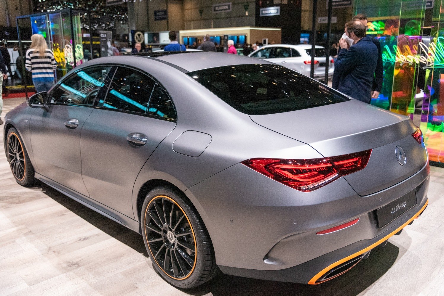 Sporty coupe rear side with sleek design and alloy wheels
