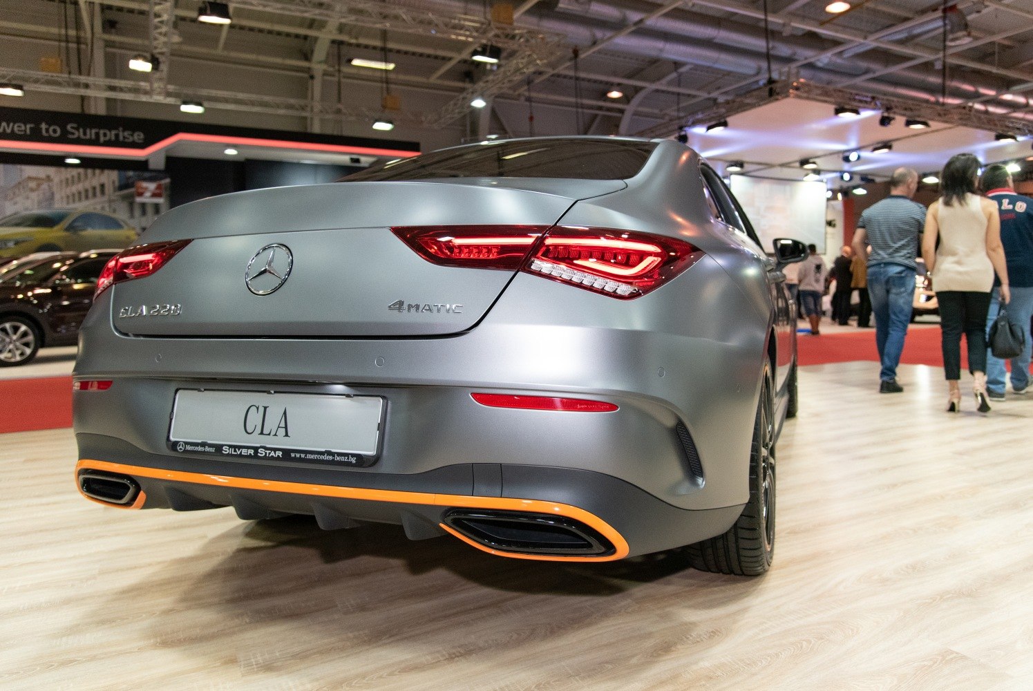 Rear of a coupe with distinctive LED tail lights and dual exhaust outlets